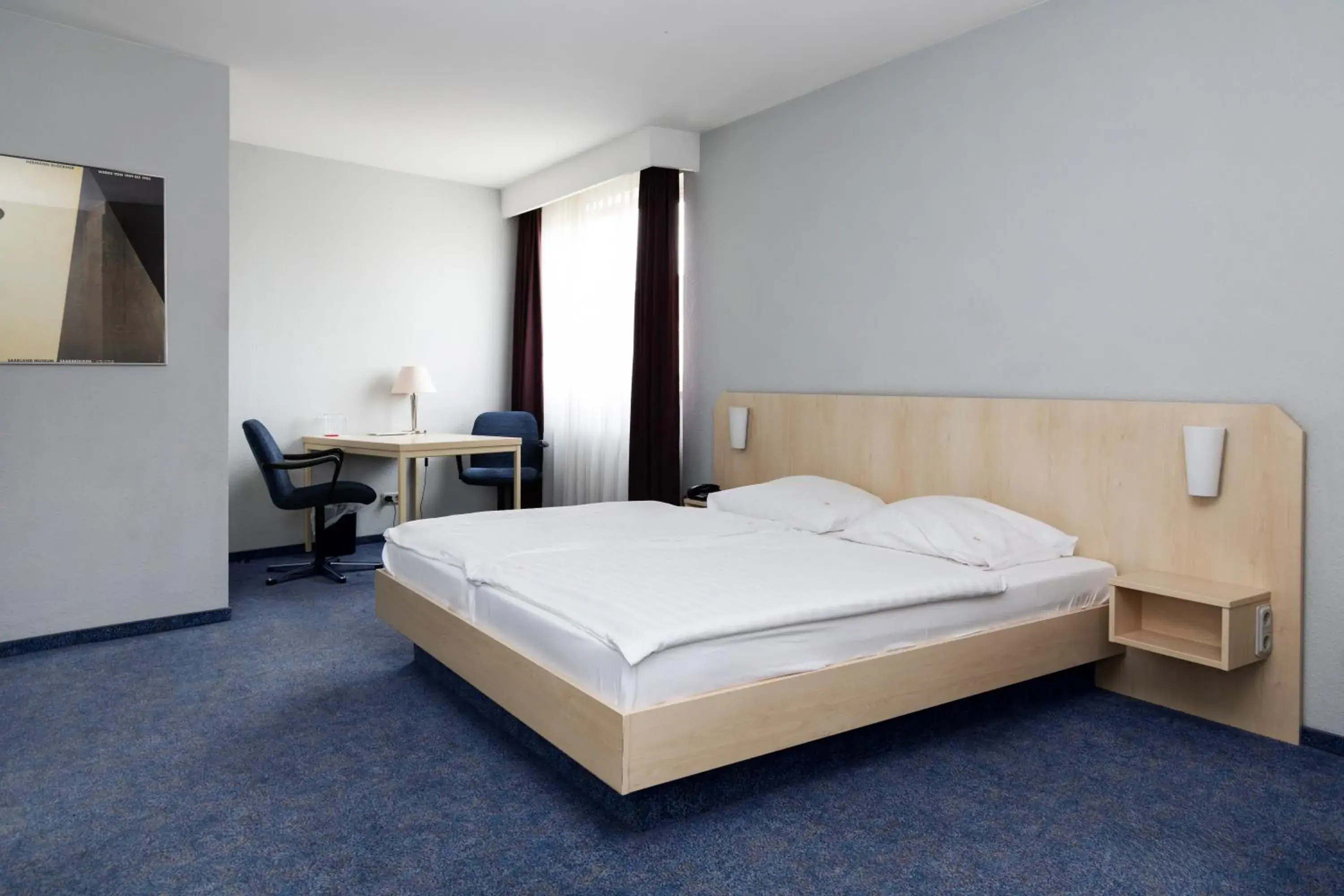 Triple Room in Hotel Meran Hallenbad & Sauna Triple Room in Hotel Meran Hallenbad & Sauna