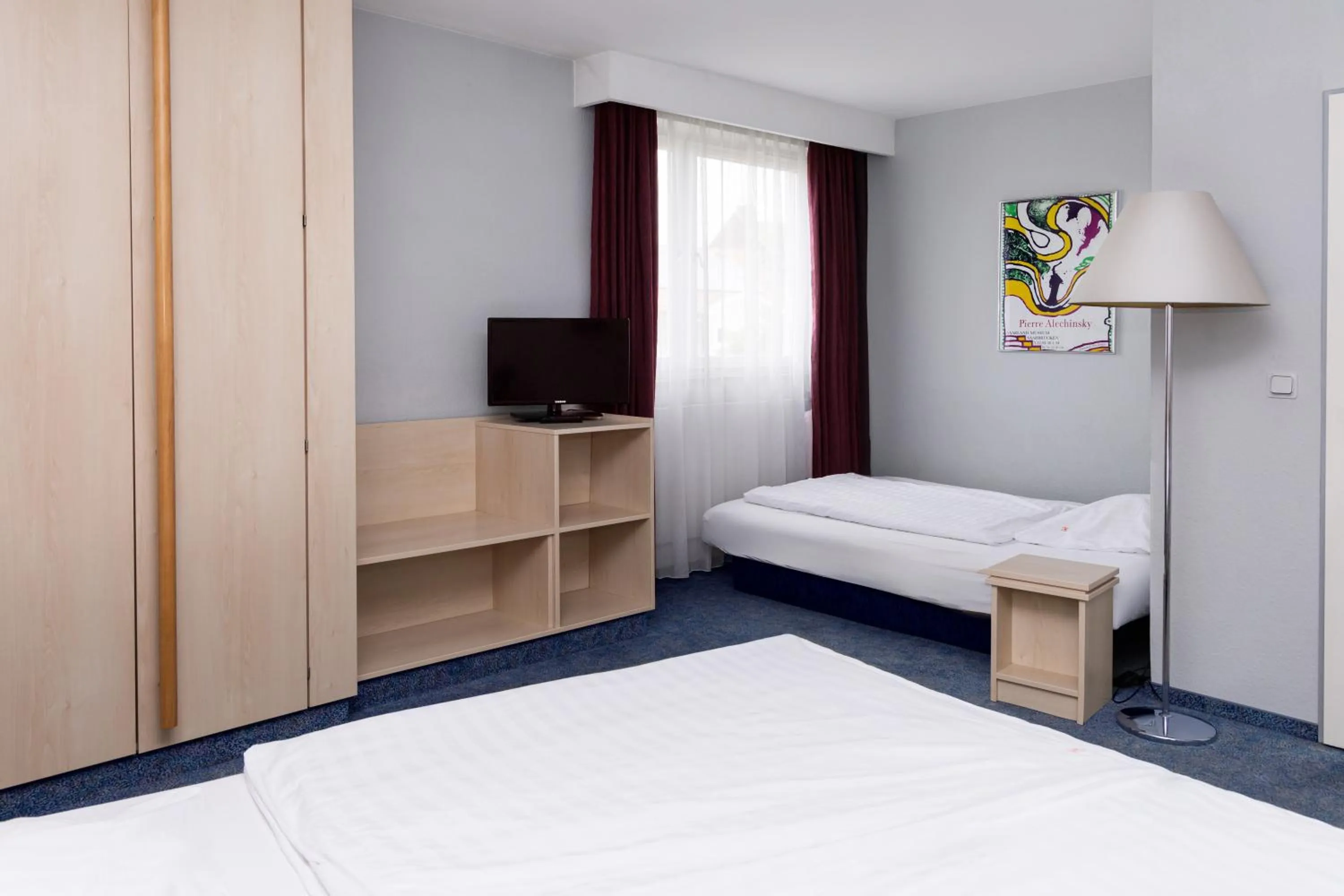 Bed in Hotel Meran Hallenbad & Sauna