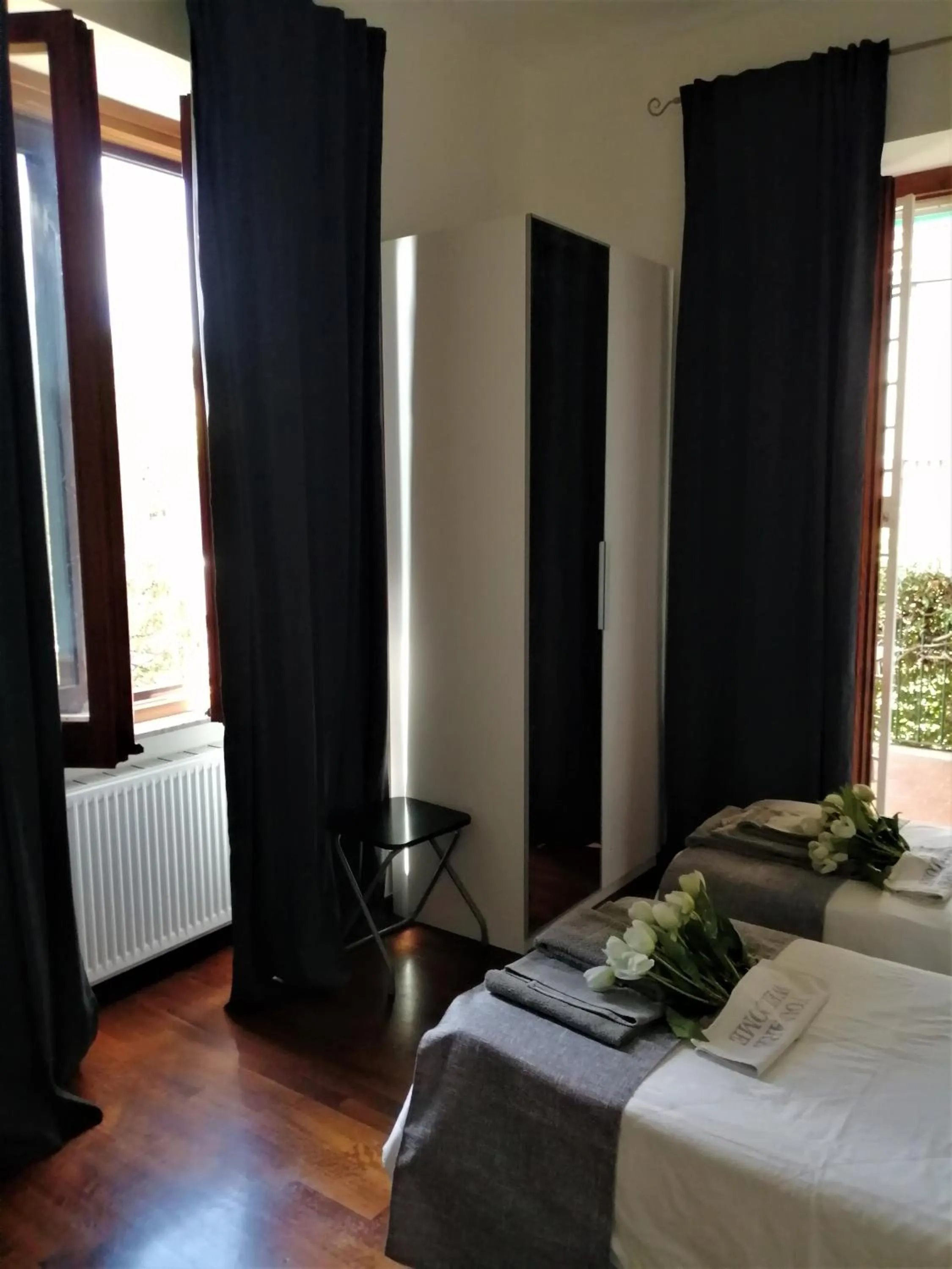 Photo of the whole room, Bed in EMI's Guest House