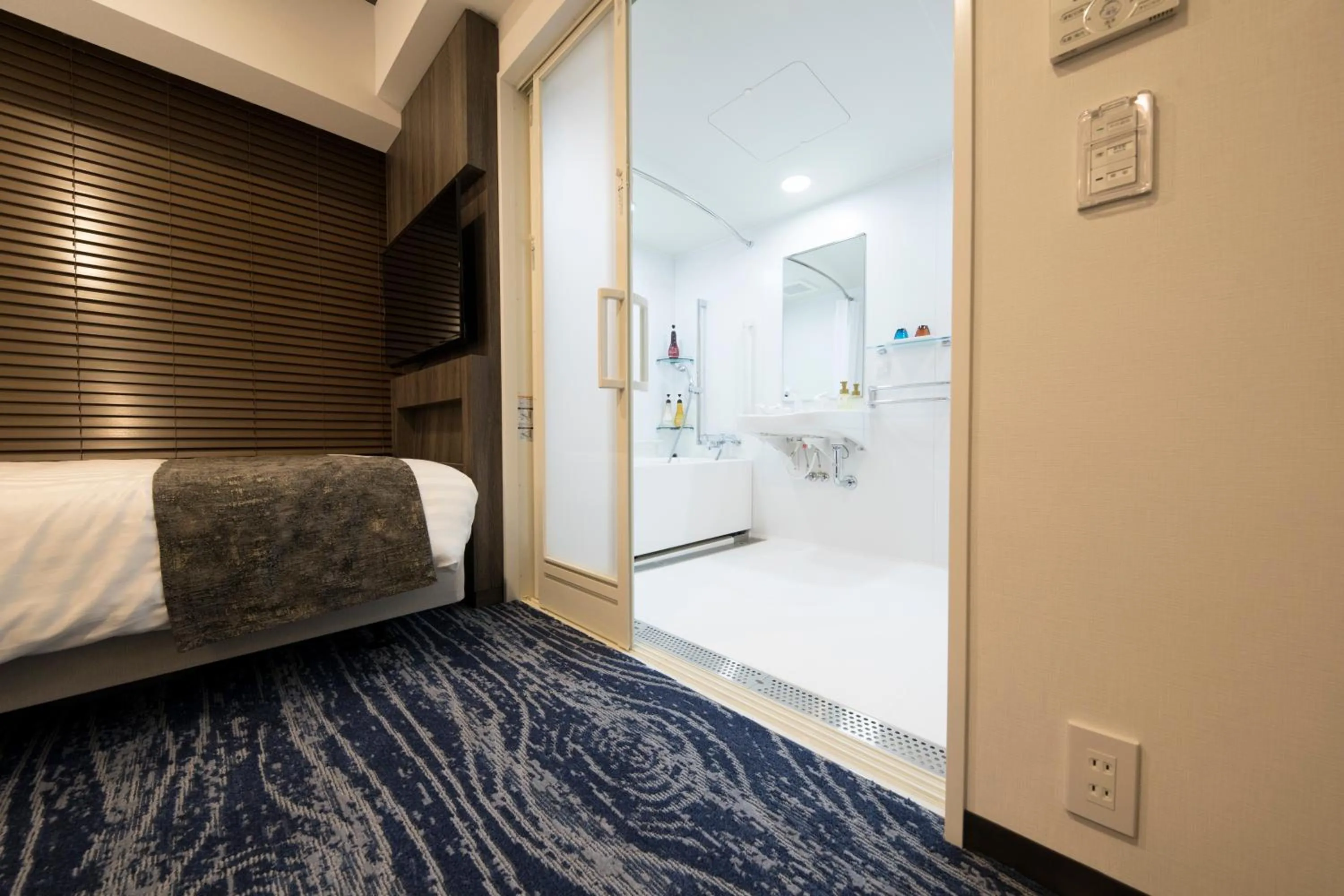 Photo of the whole room, Bed in Quintessa Hotel Sapporo Susukino