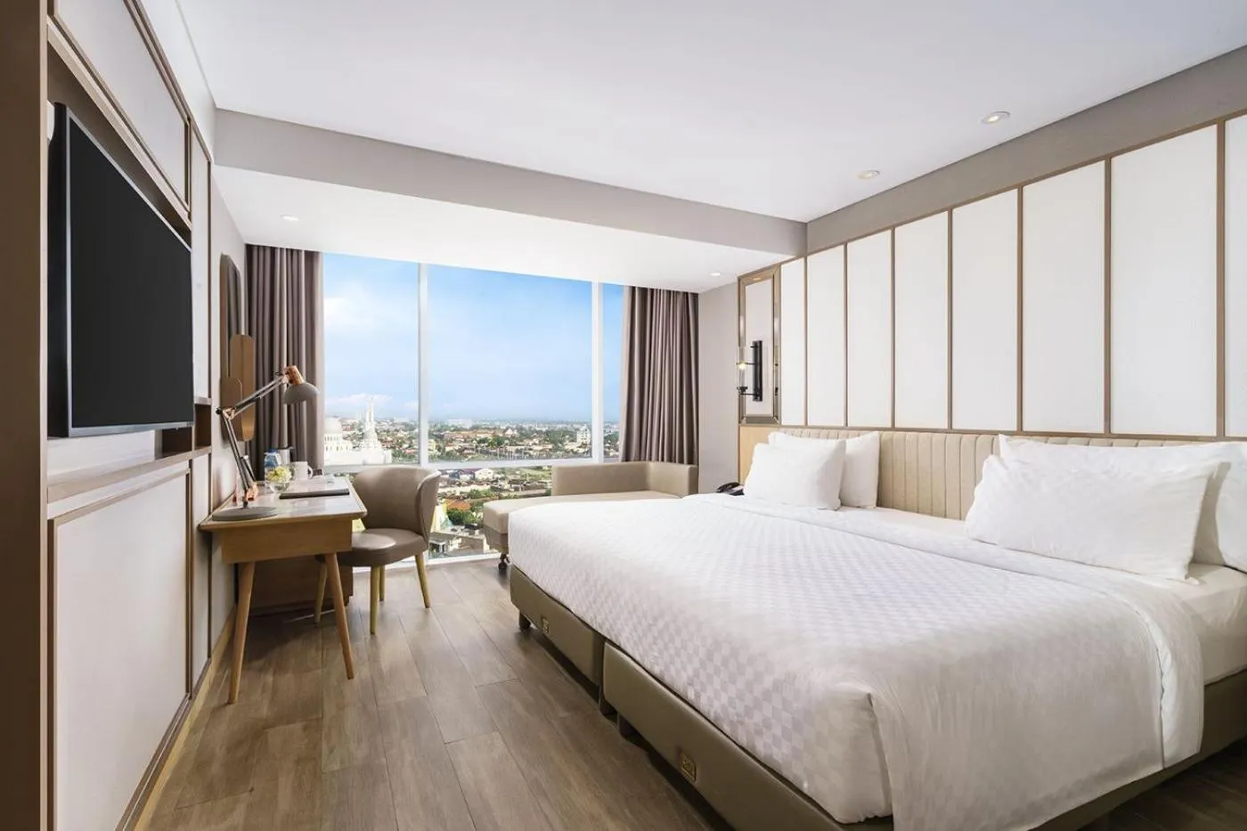 Bed in Swiss-Belhotel Solo