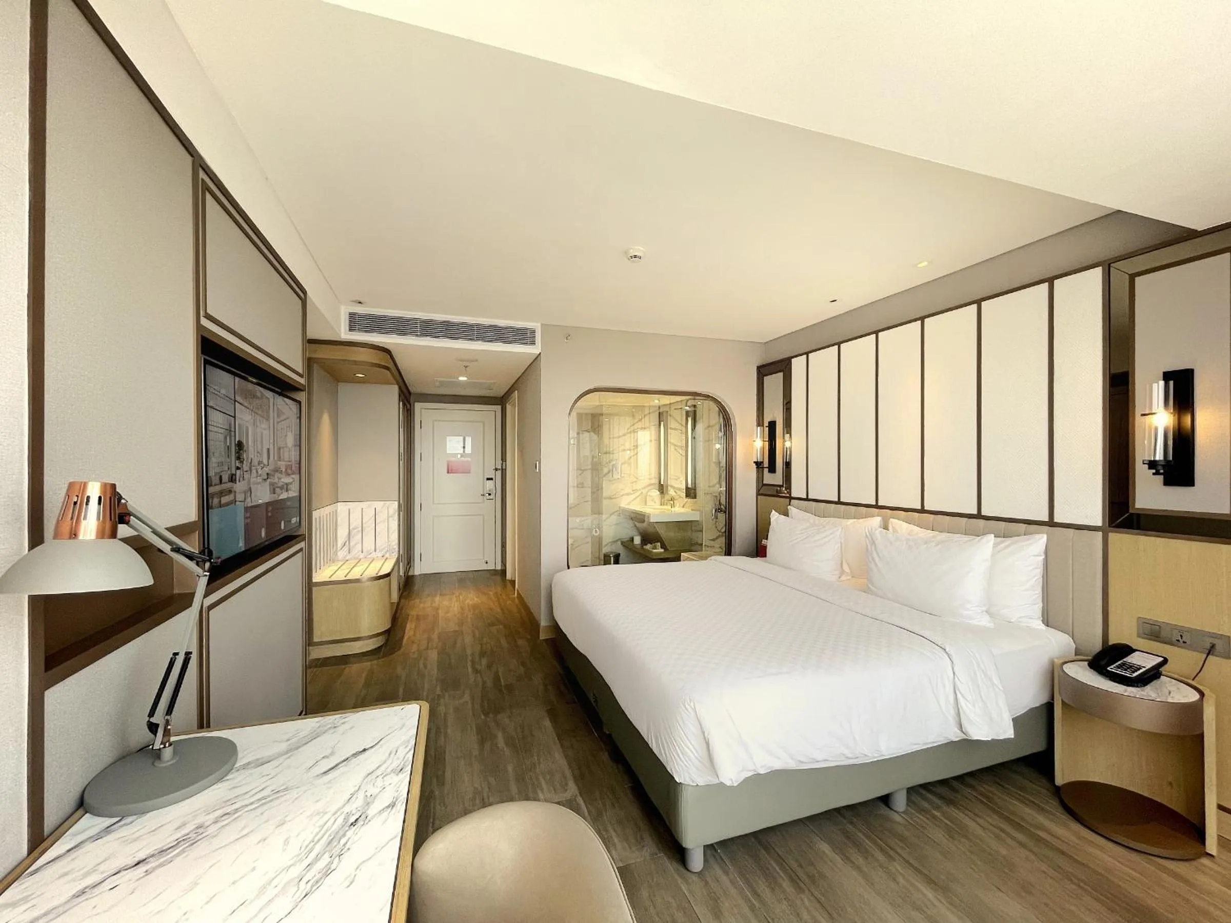 Bed in Swiss-Belhotel Solo