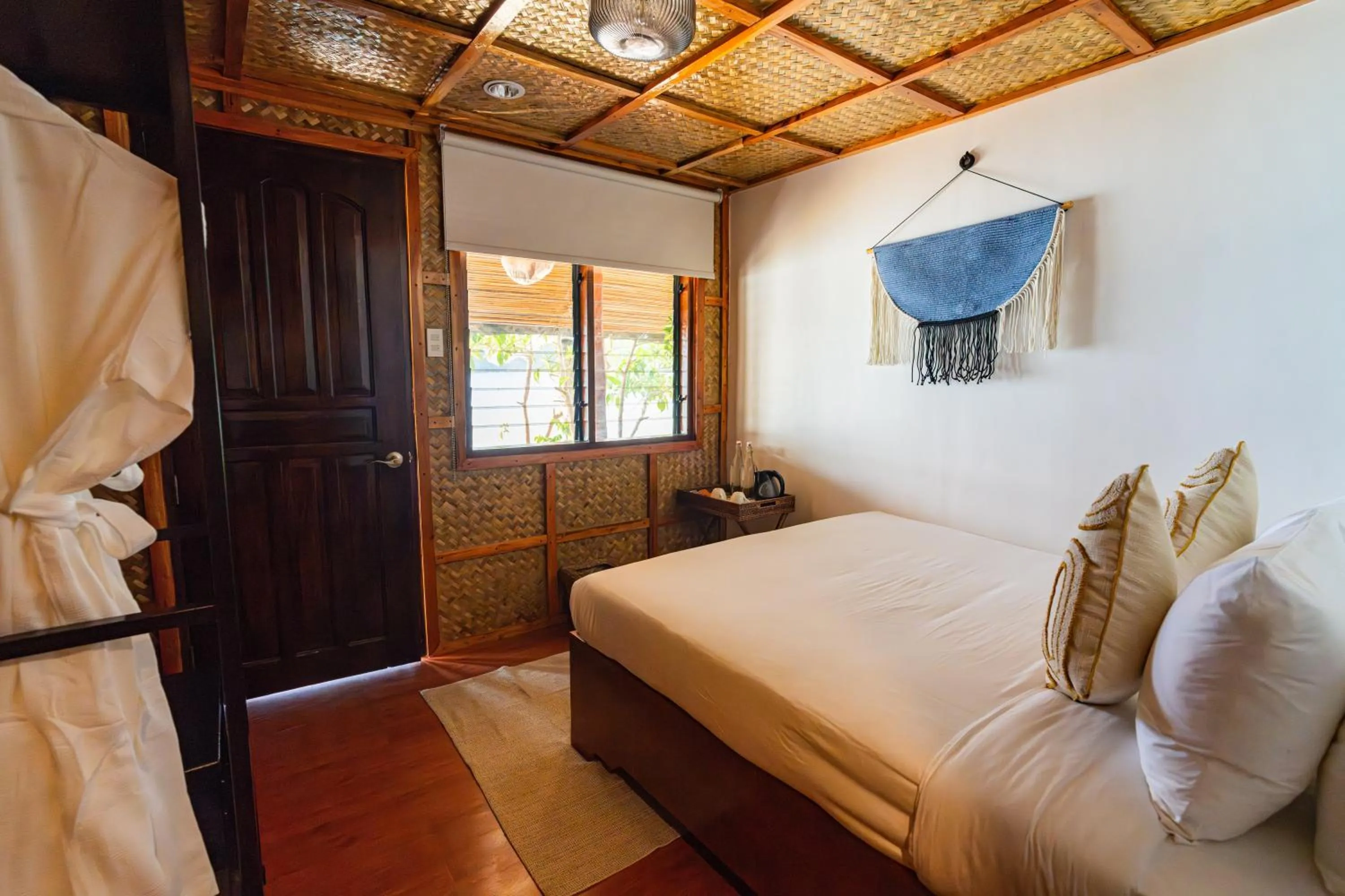 Bed in Beach Huts El Nido