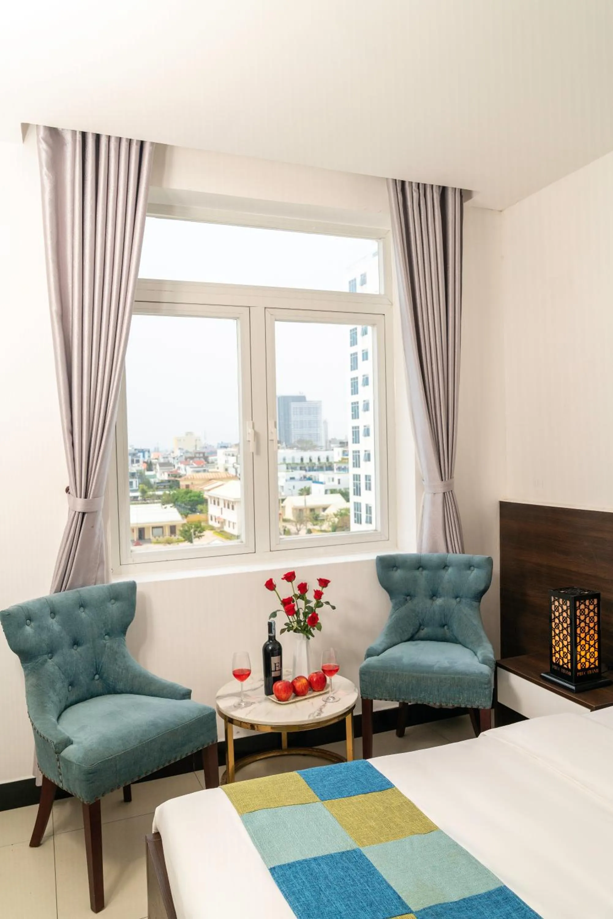 Living room in Phuc Thanh Luxury Hotel by THG