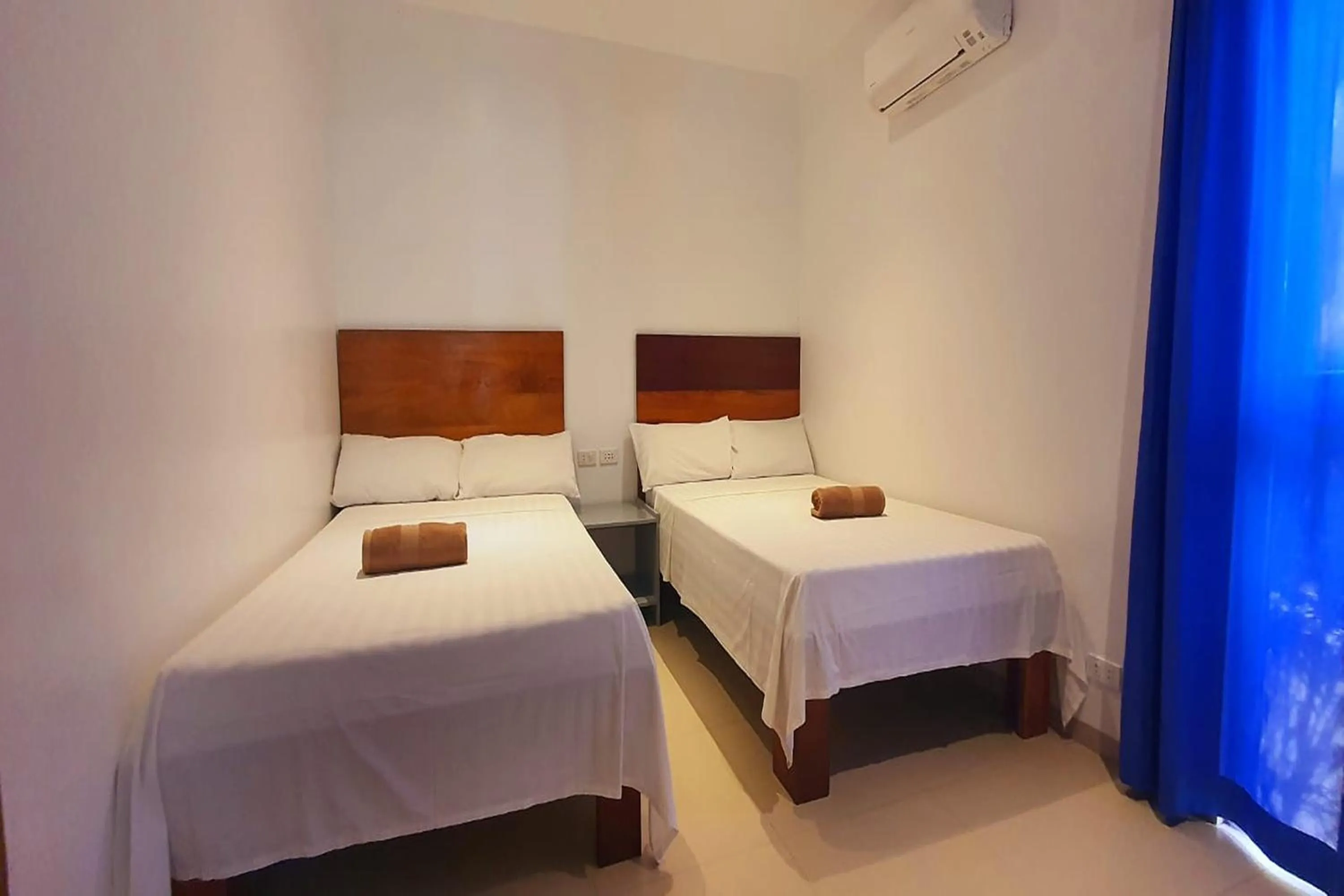 Bedroom, Bed in Pili Beach Resort Agmanic