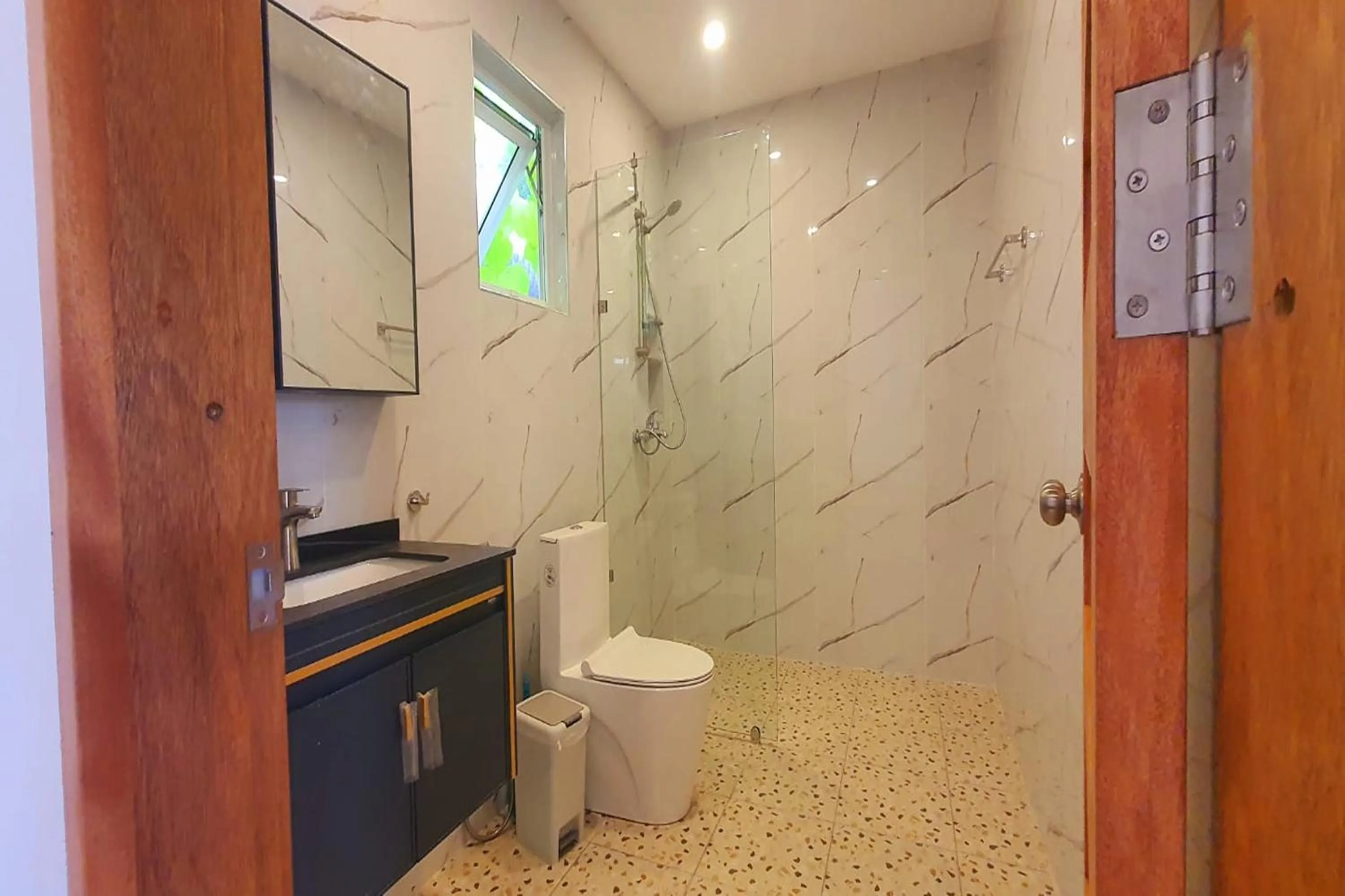 Bathroom in Pili Beach Resort Agmanic