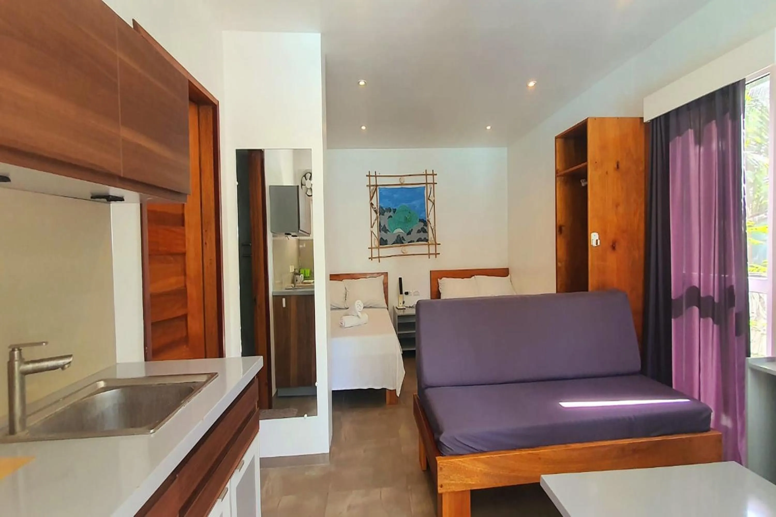 Bedroom in Pili Beach Resort Agmanic