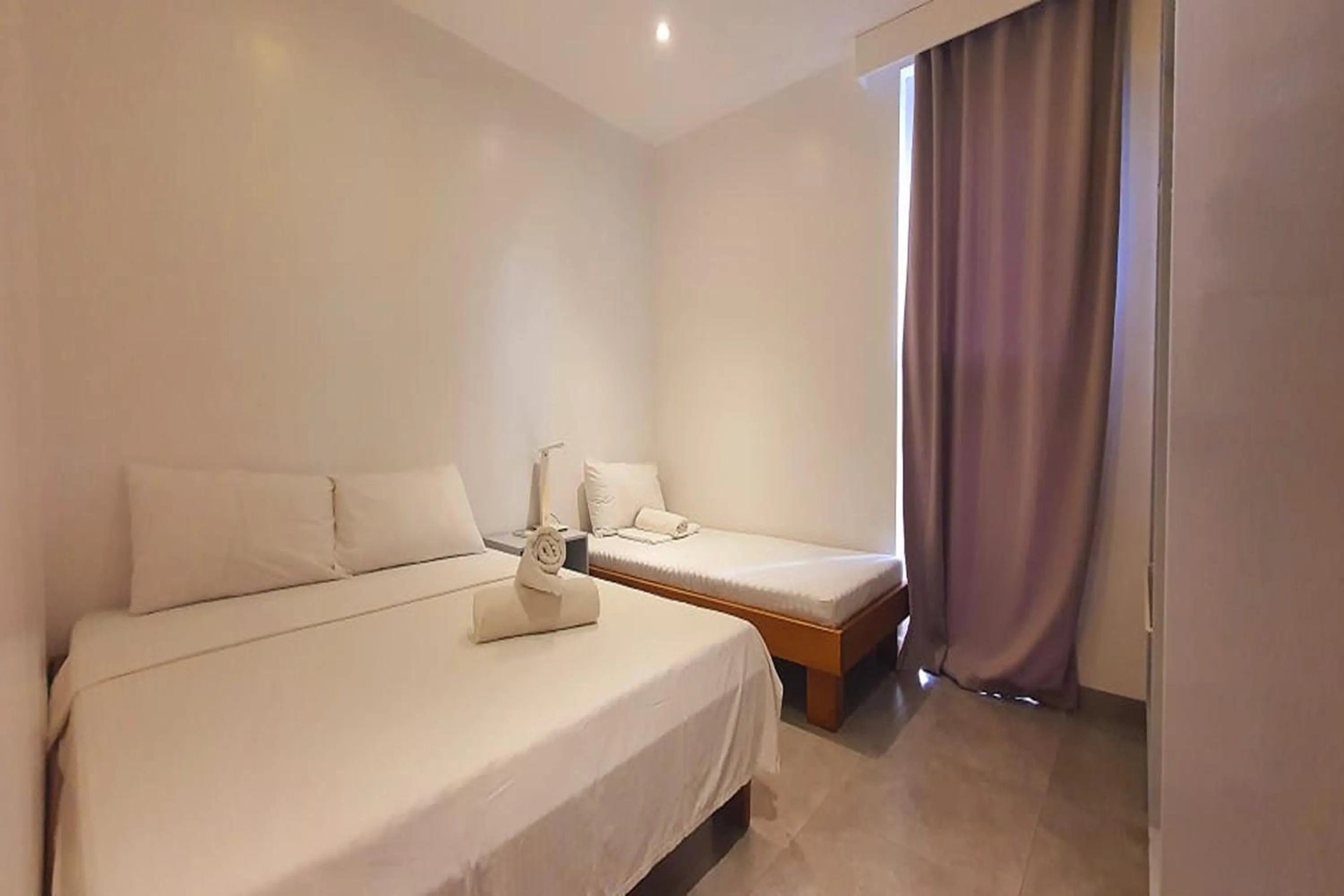 Bedroom, Bed in Pili Beach Resort Agmanic