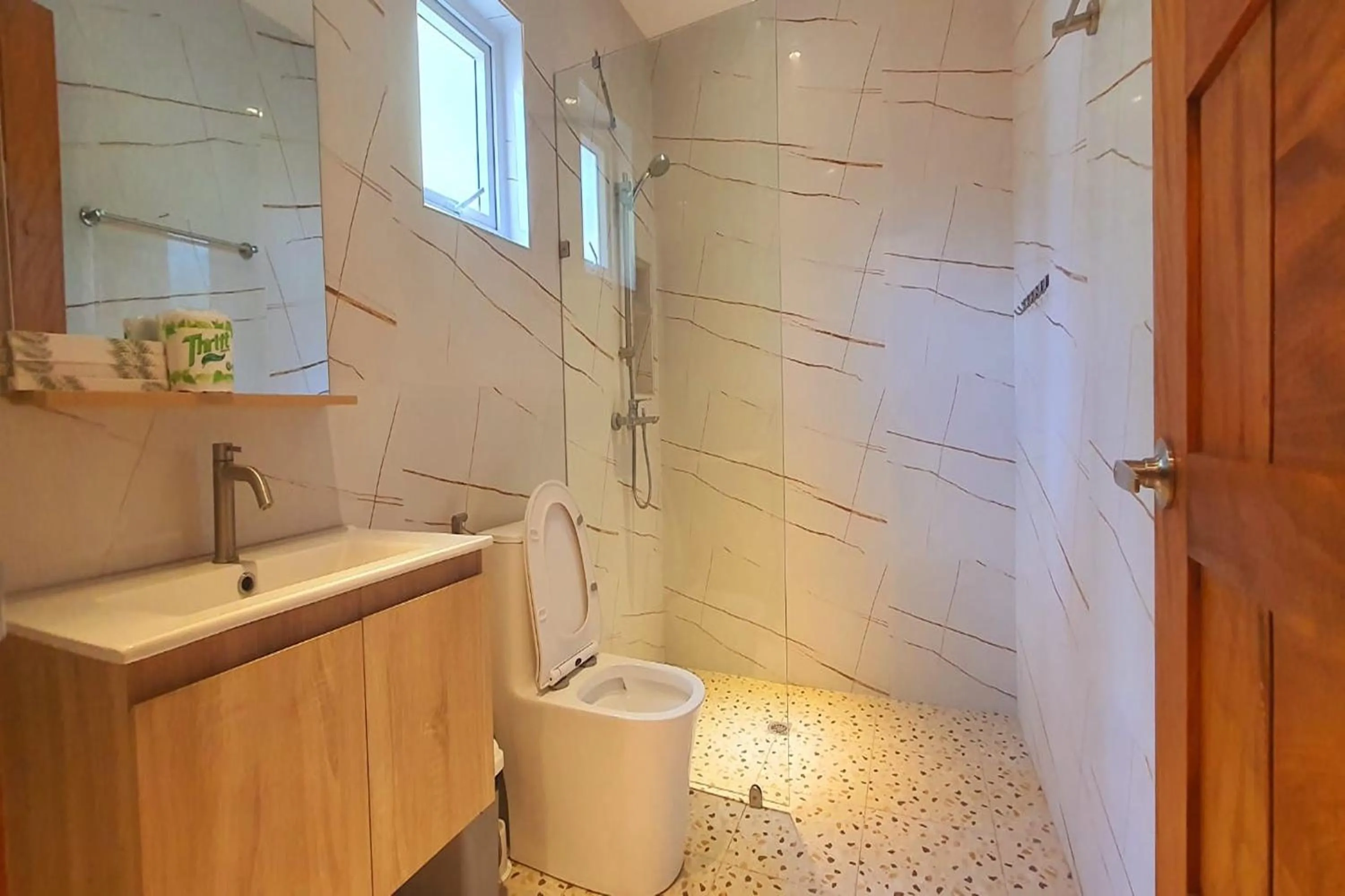 Bathroom in Pili Beach Resort Agmanic