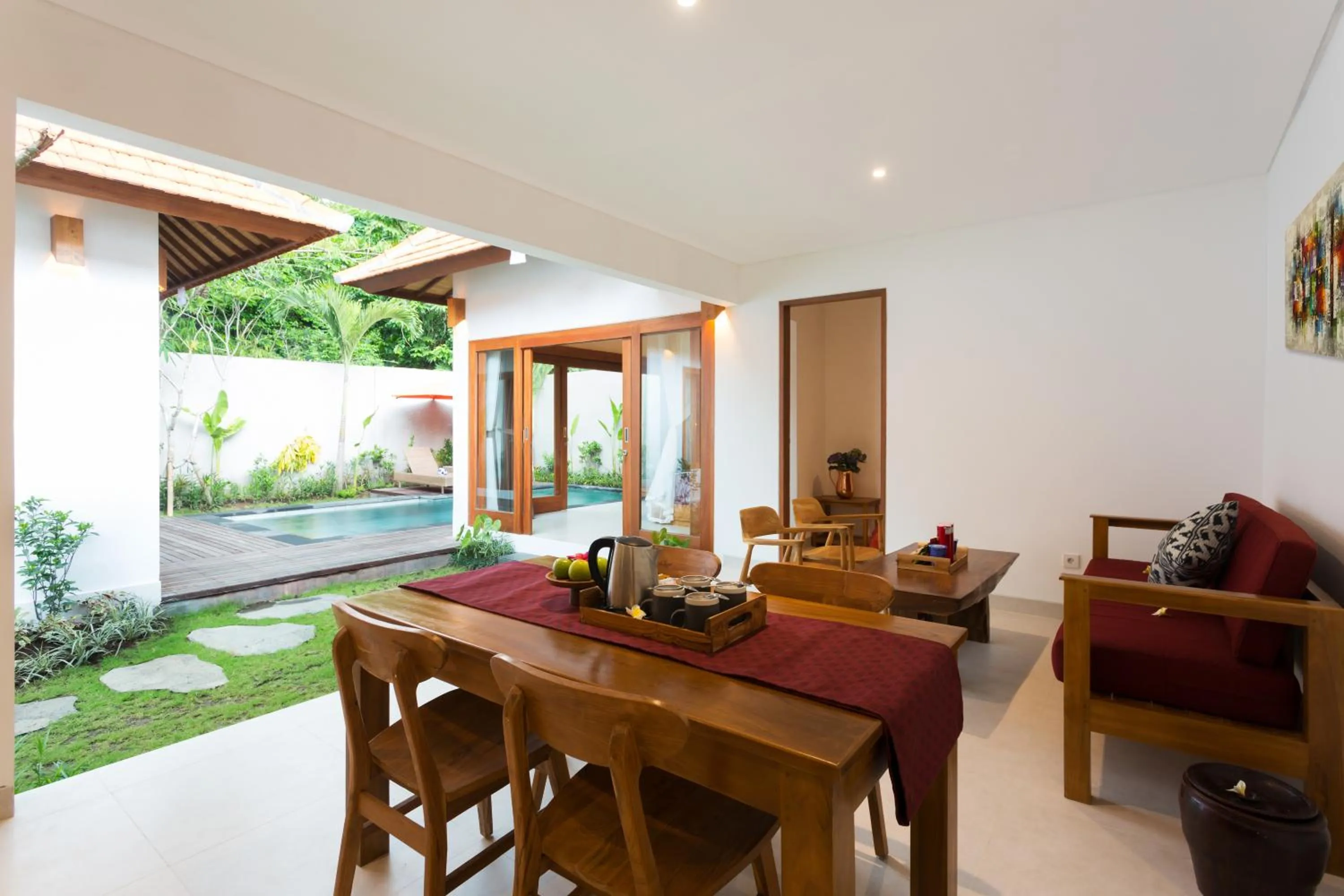 Dining area in de Metra Villa Ubud by GenuineHost
