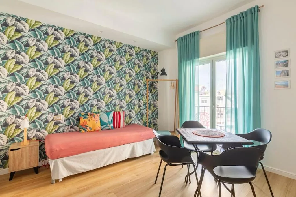 Dining area, Bed in Tufo Giallo Rooms