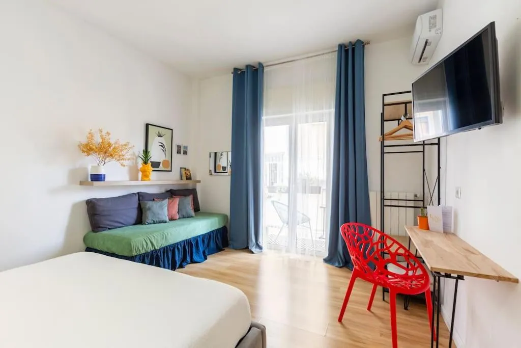 Photo of the whole room in Tufo Giallo Rooms