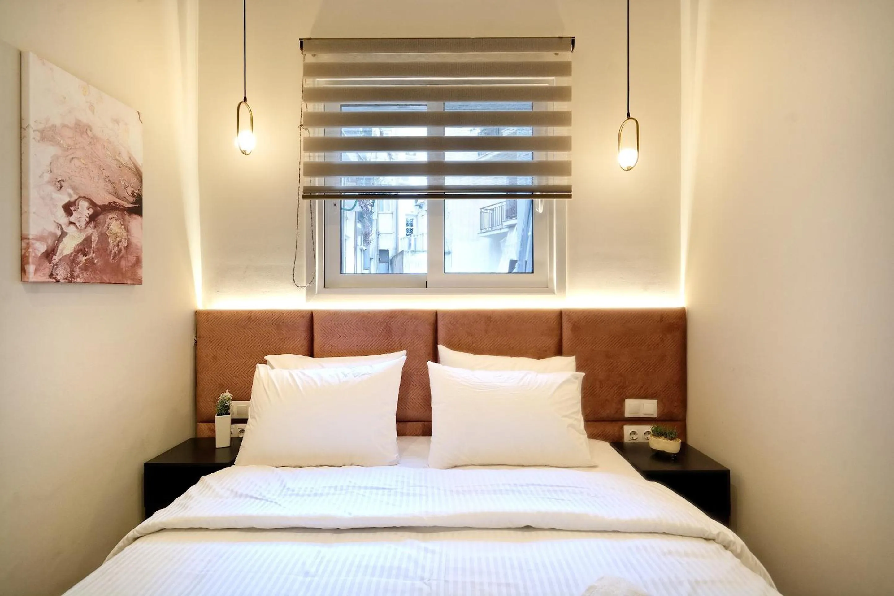 Bed in The Flirty Athens apartment