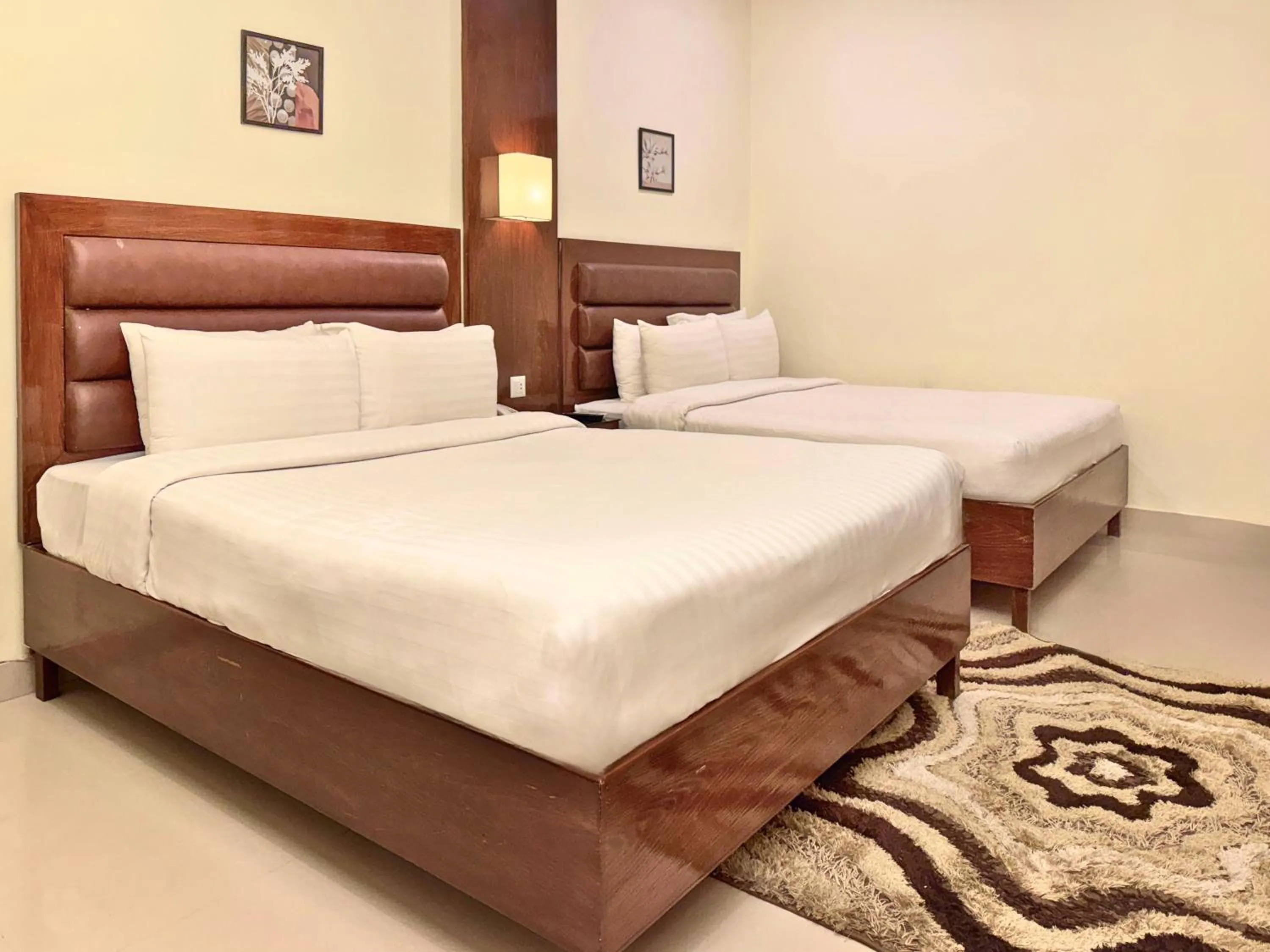 Bed in Hotel One DG Khan