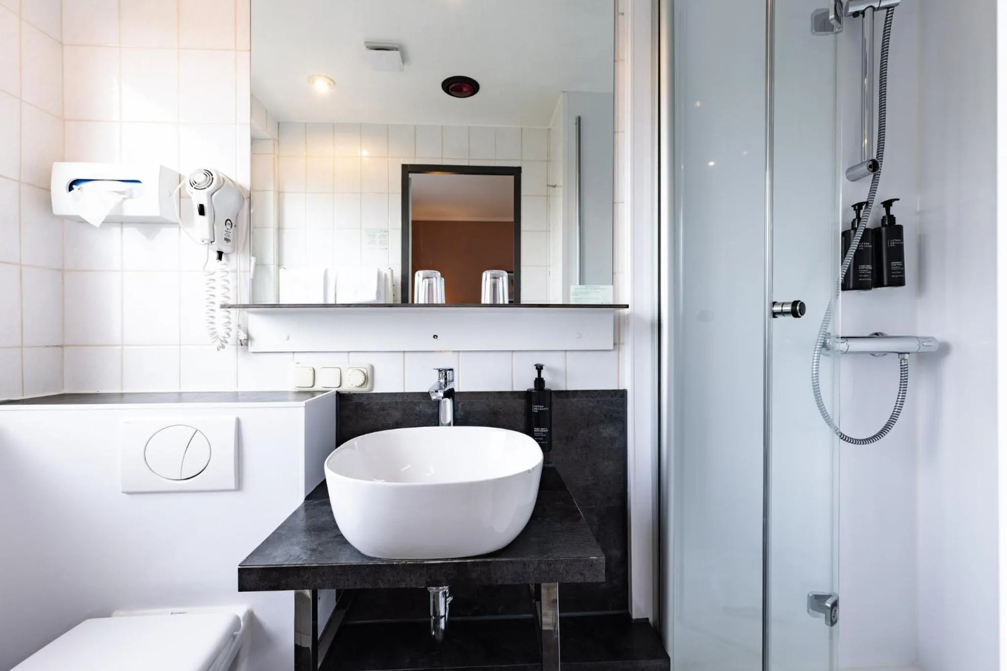 Bathroom in Garner Hotel Bremen North by IHG