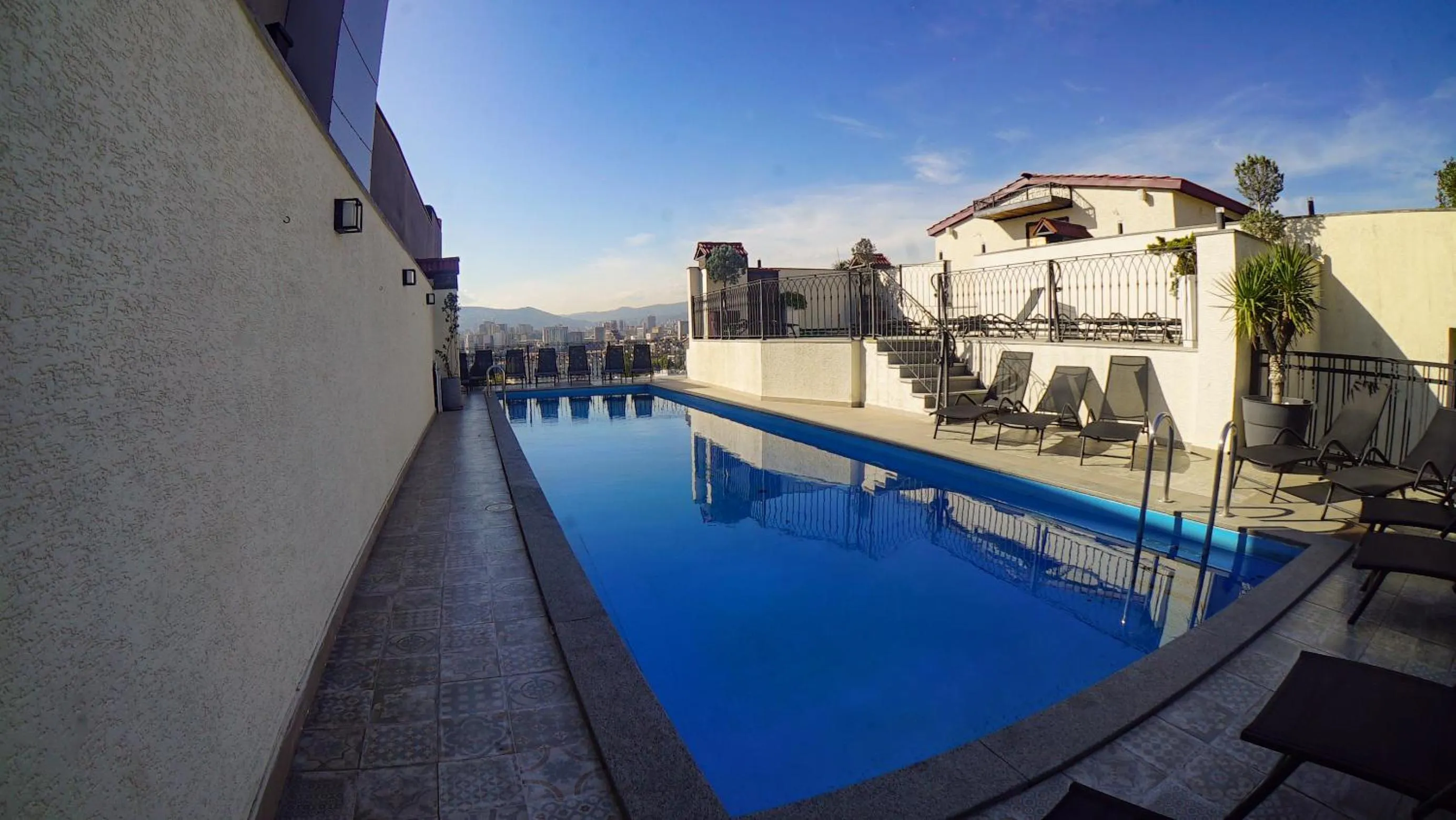 Swimming pool in TM Apart Hotel