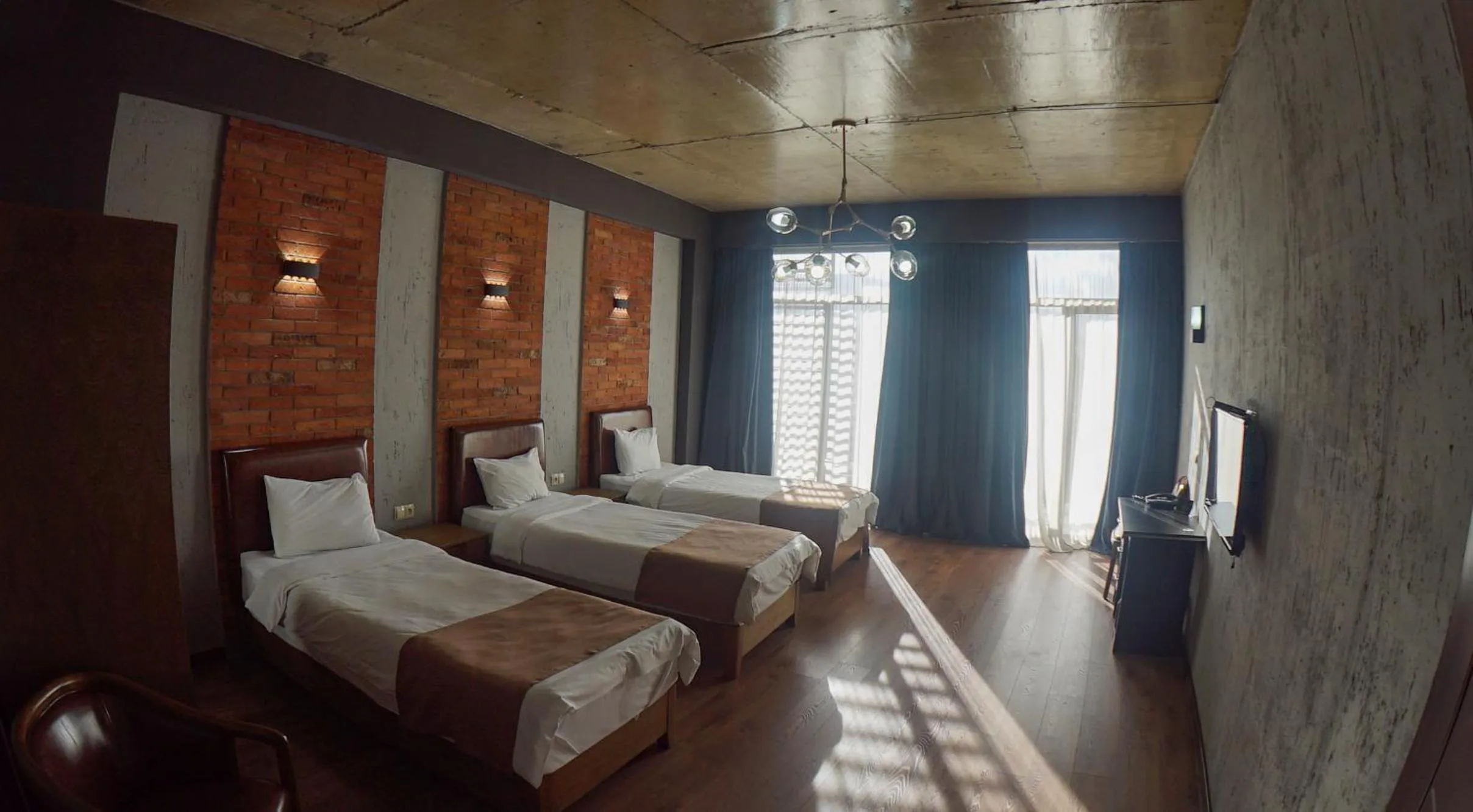 Bed in TM Apart Hotel