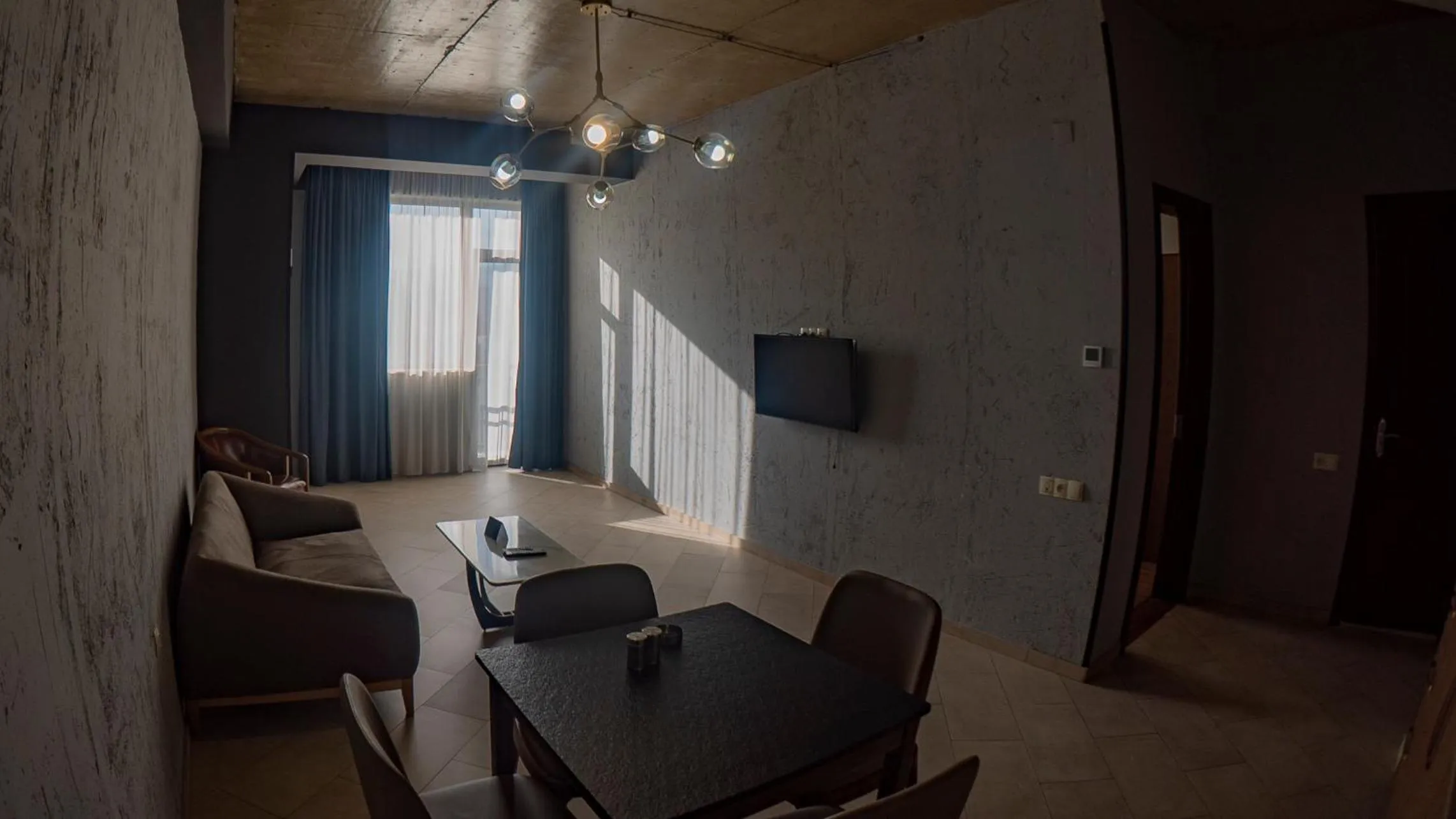 Living room in TM Apart Hotel