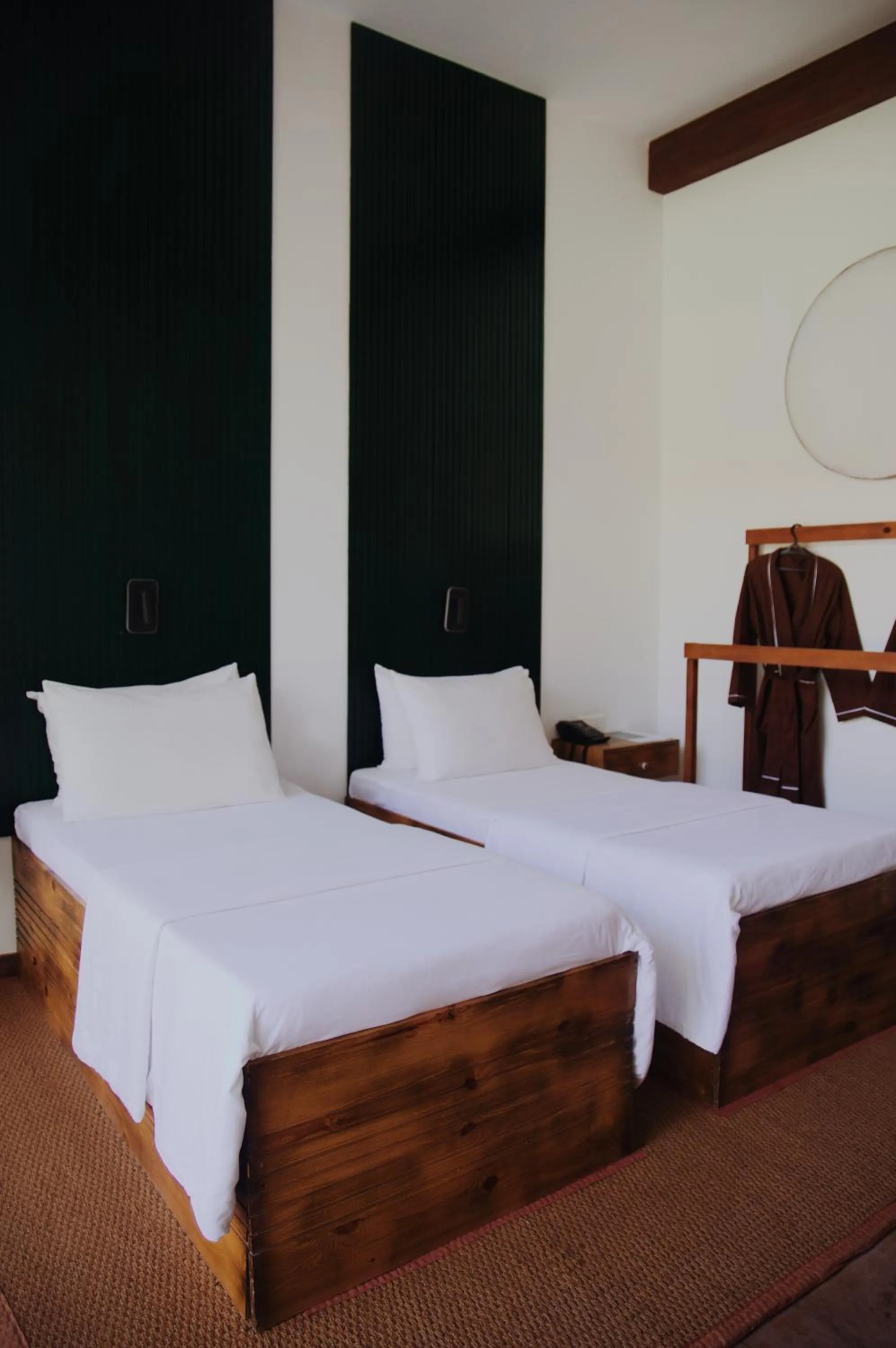 Bed in Palm Garden Ayurveda Resort