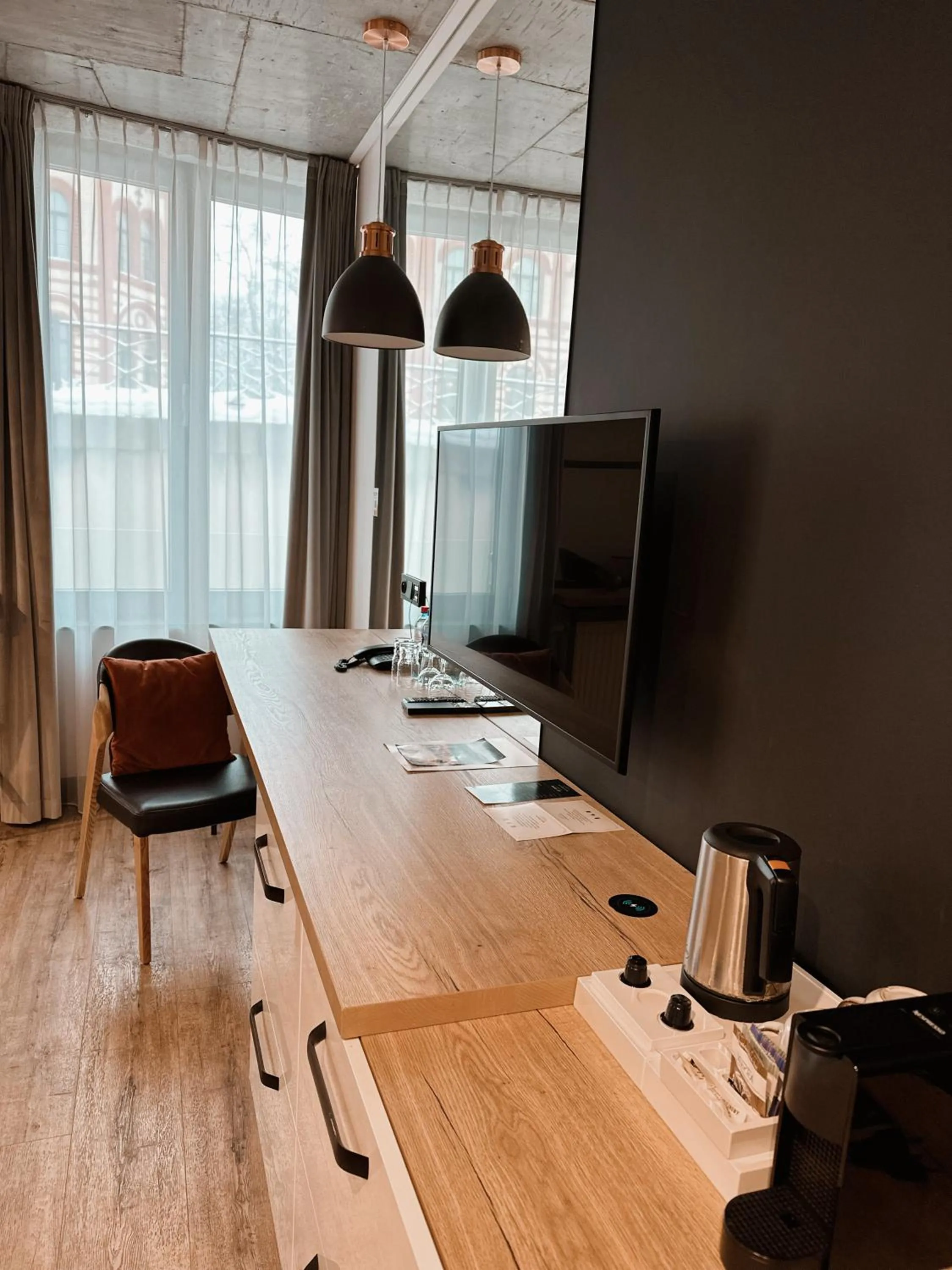 TV and multimedia in The Bridge Suites Hotel