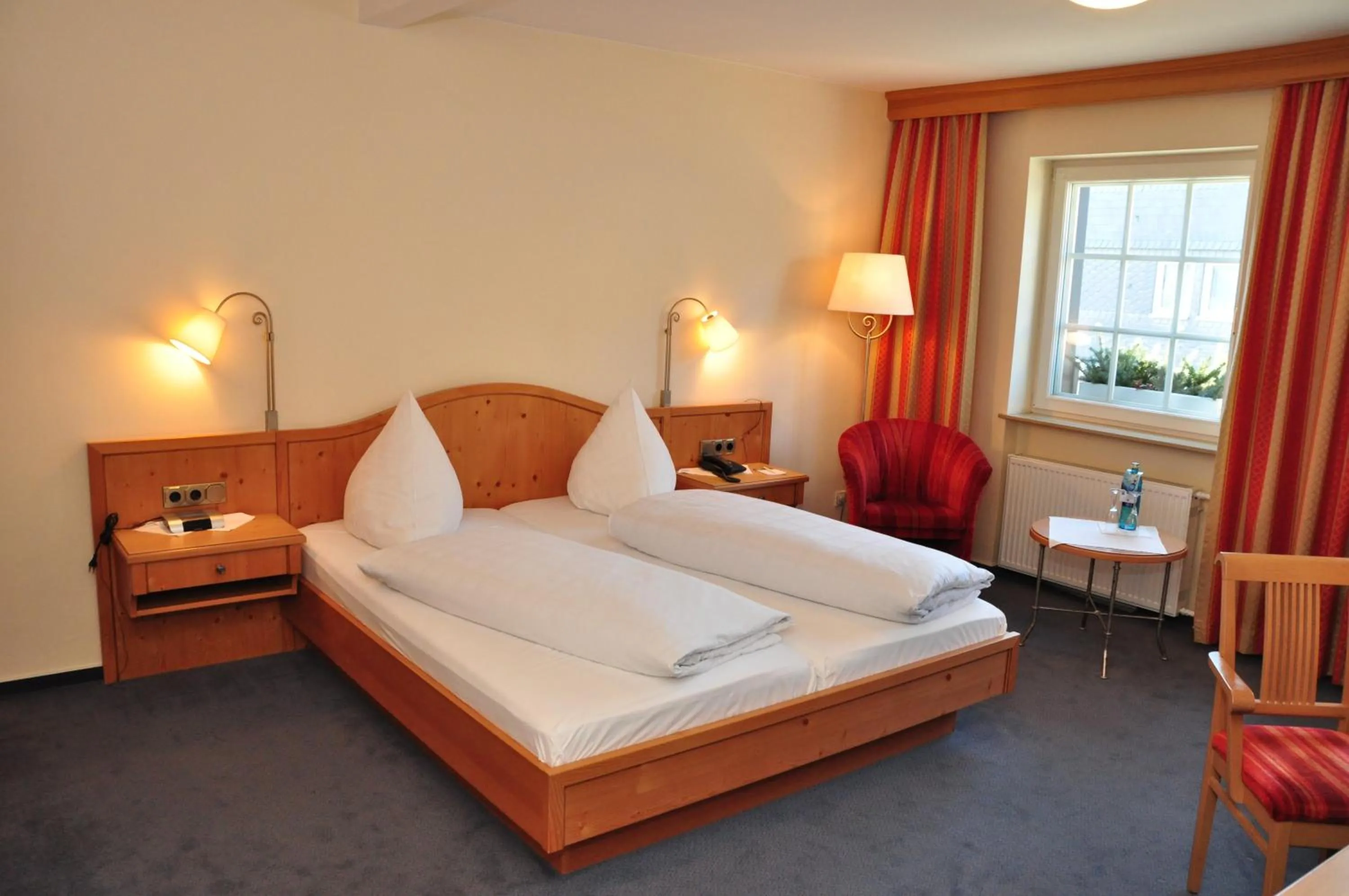 Photo of the whole room, Bed in Hotel Sauerländer Hof