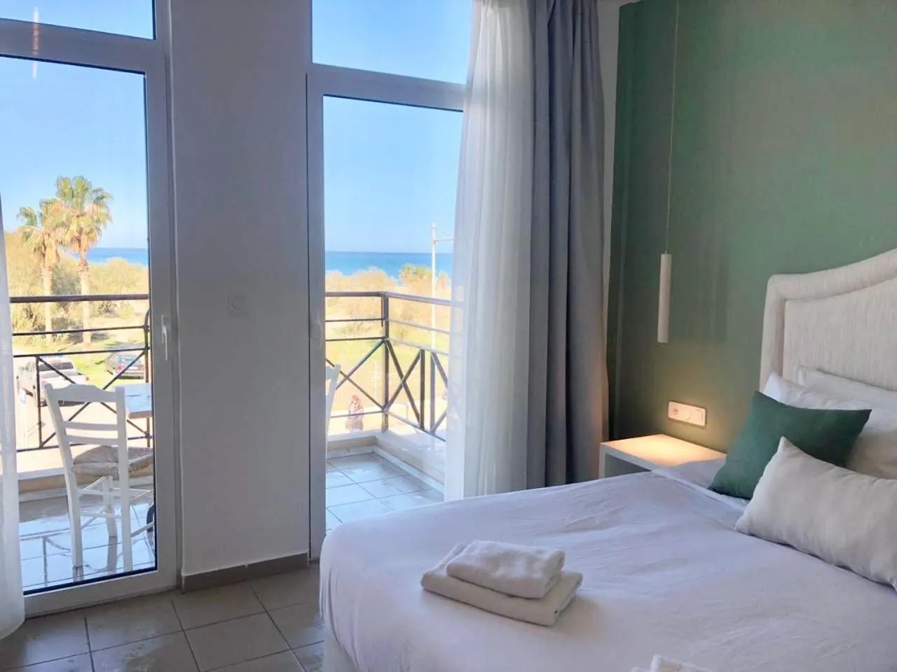 Bed in Thalyra Boutique Hotel