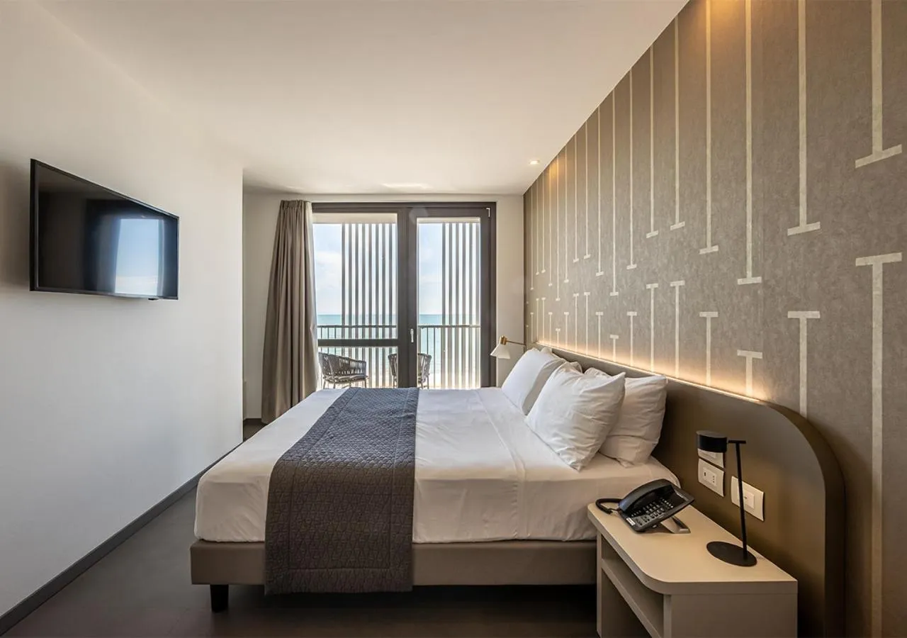 Bedroom, Bed in DIVA HOTEL LIGNANO - Adults Only