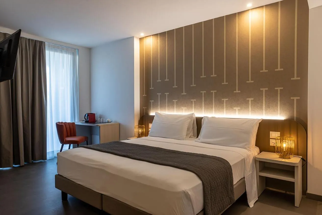 Bedroom, Bed in DIVA HOTEL LIGNANO - Adults Only