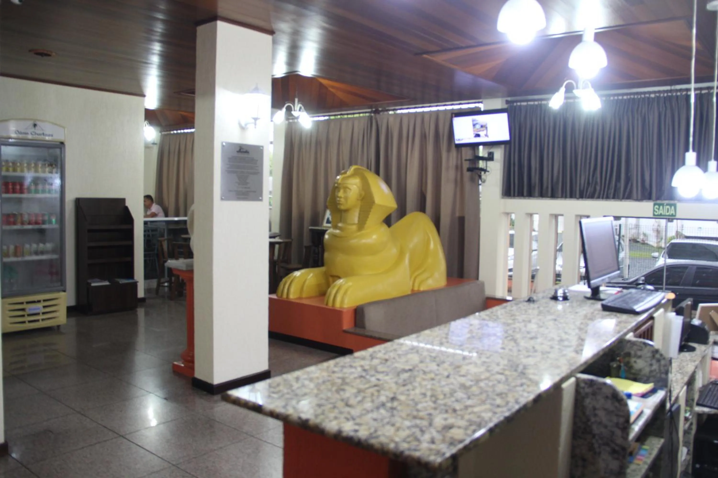 Communal lounge/ TV room in Oasis Chartouni Hotel