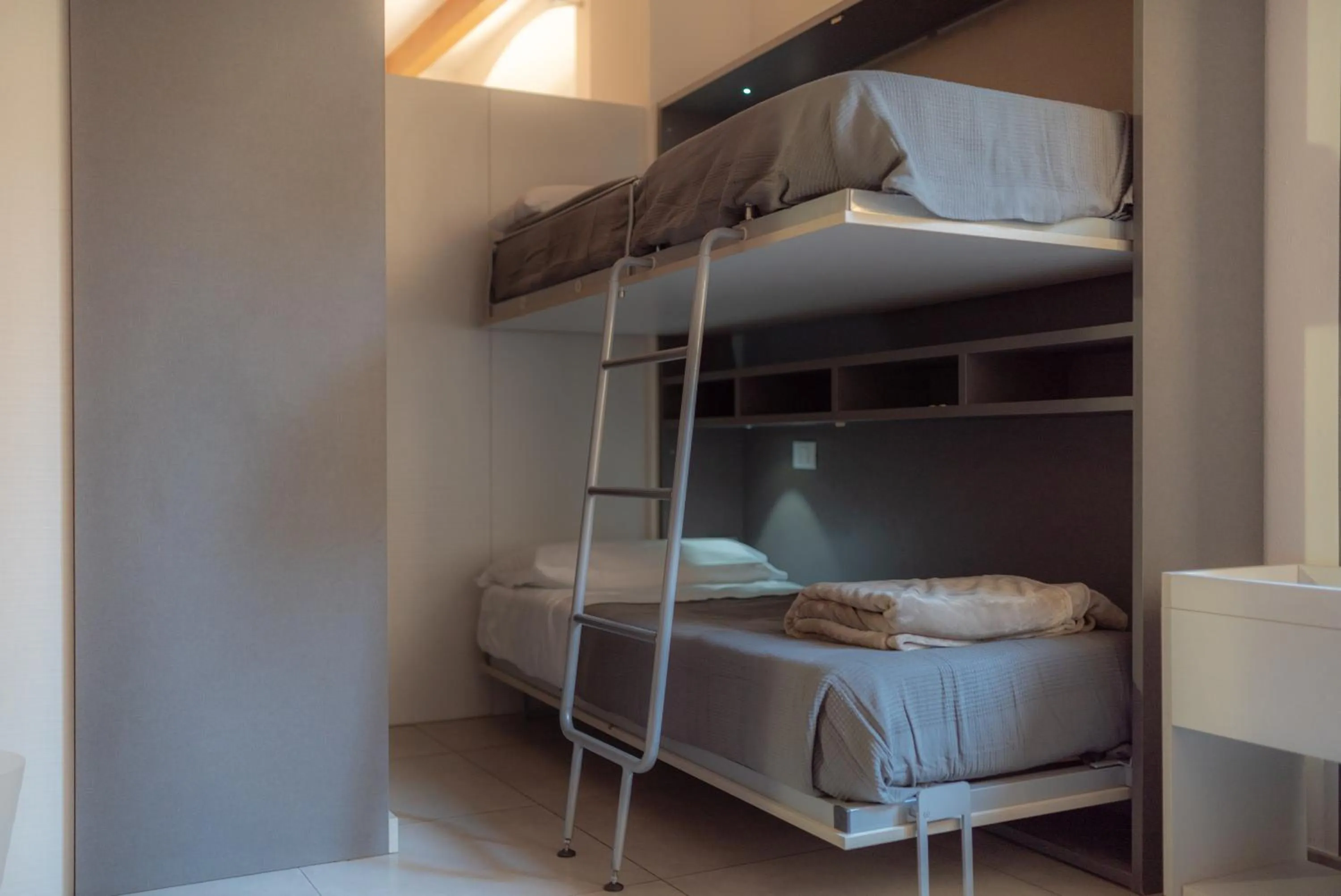 bunk bed in LUOGO COMUNE Ostello