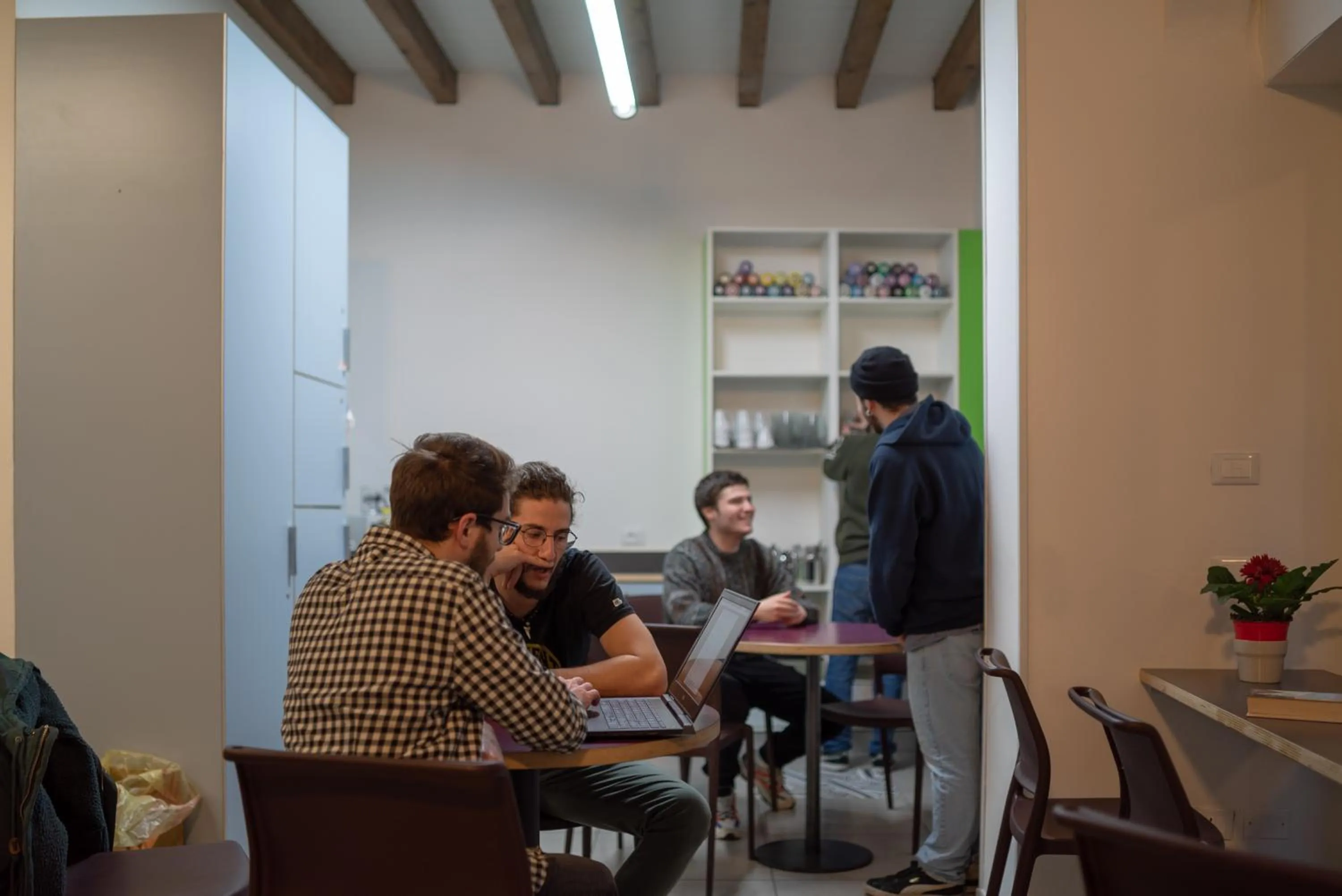 Communal lounge/ TV room in LUOGO COMUNE Ostello