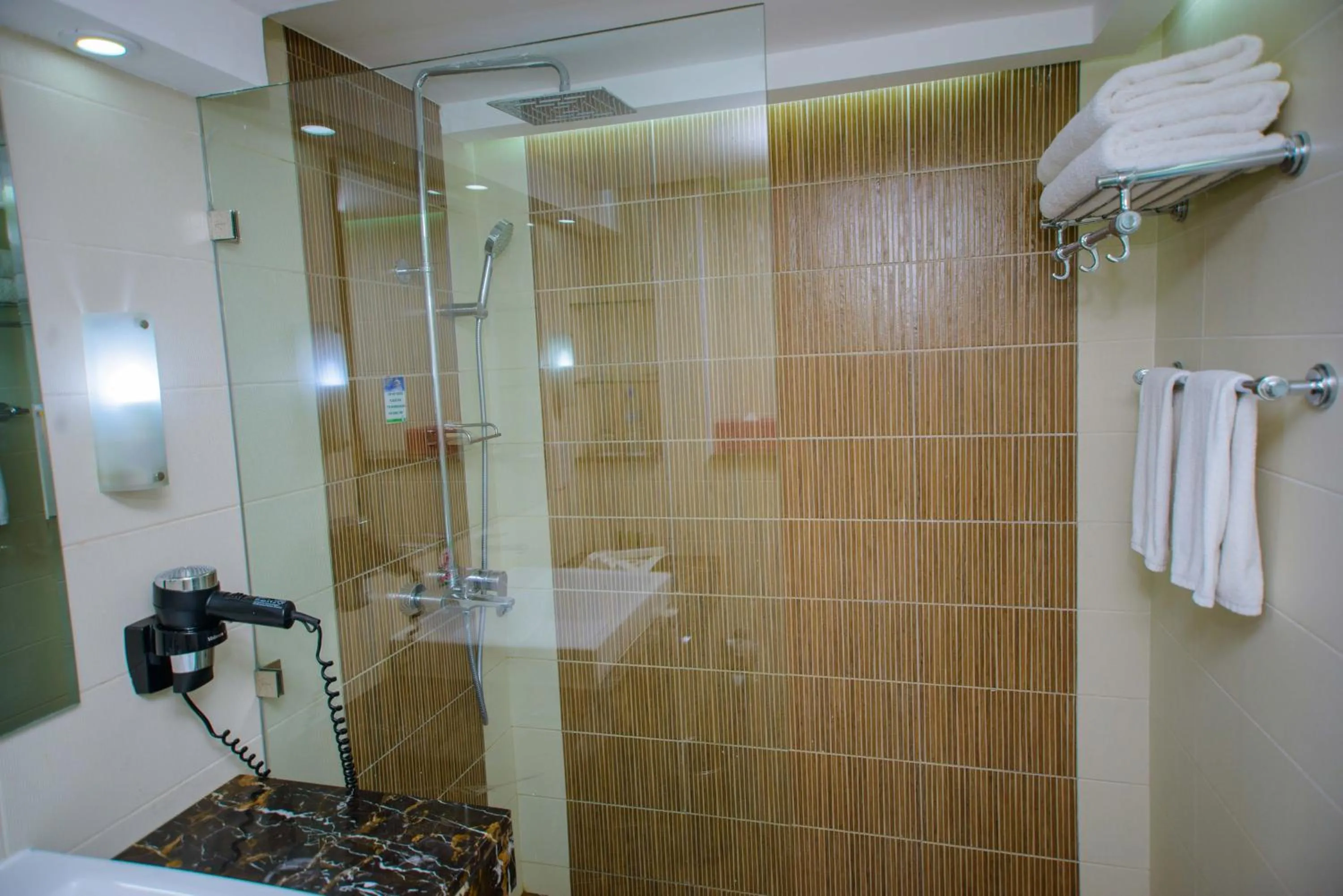 Toilet in Holiday Inn Dar Es Salaam by IHG