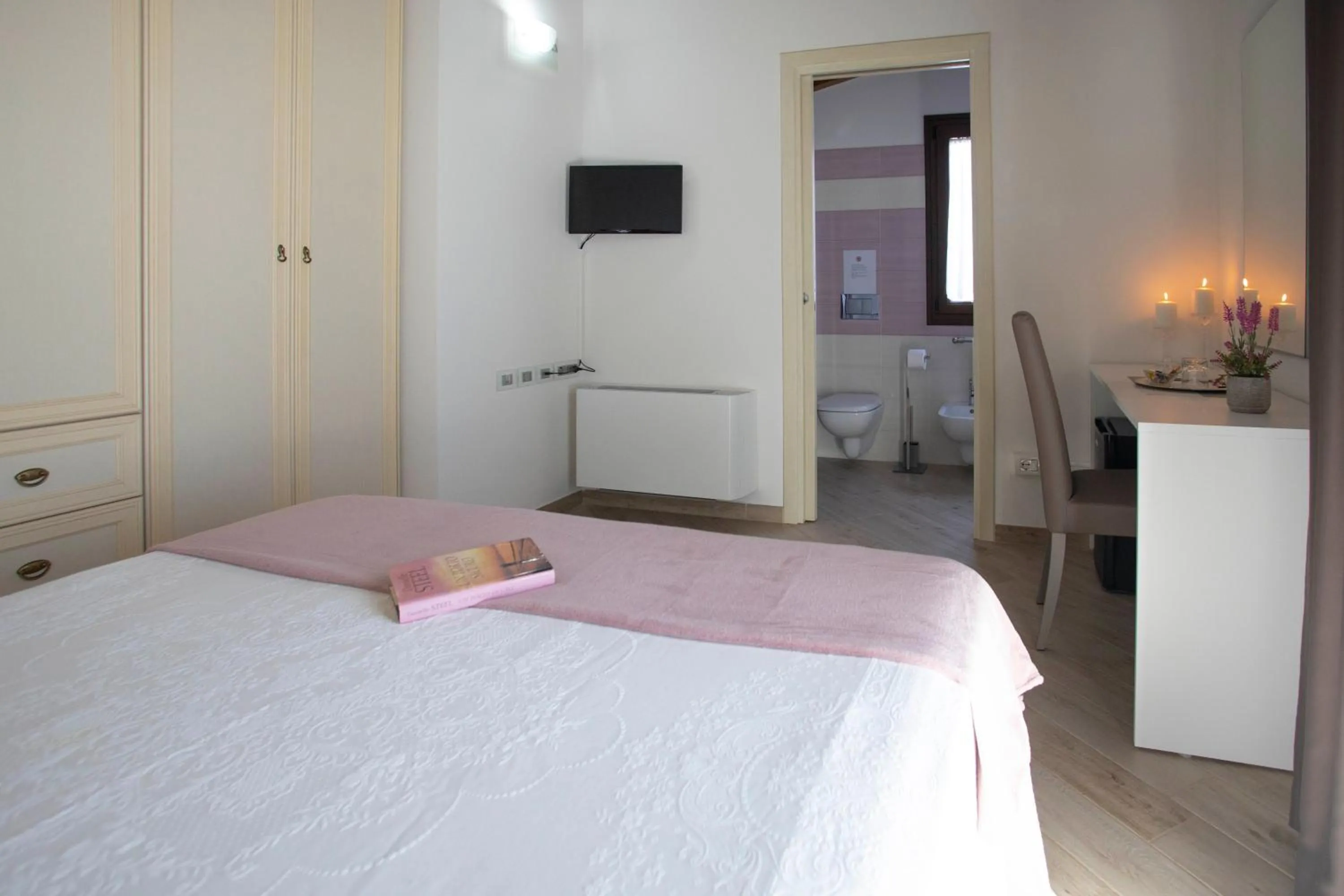 Bed in Irilor Luxury B&B