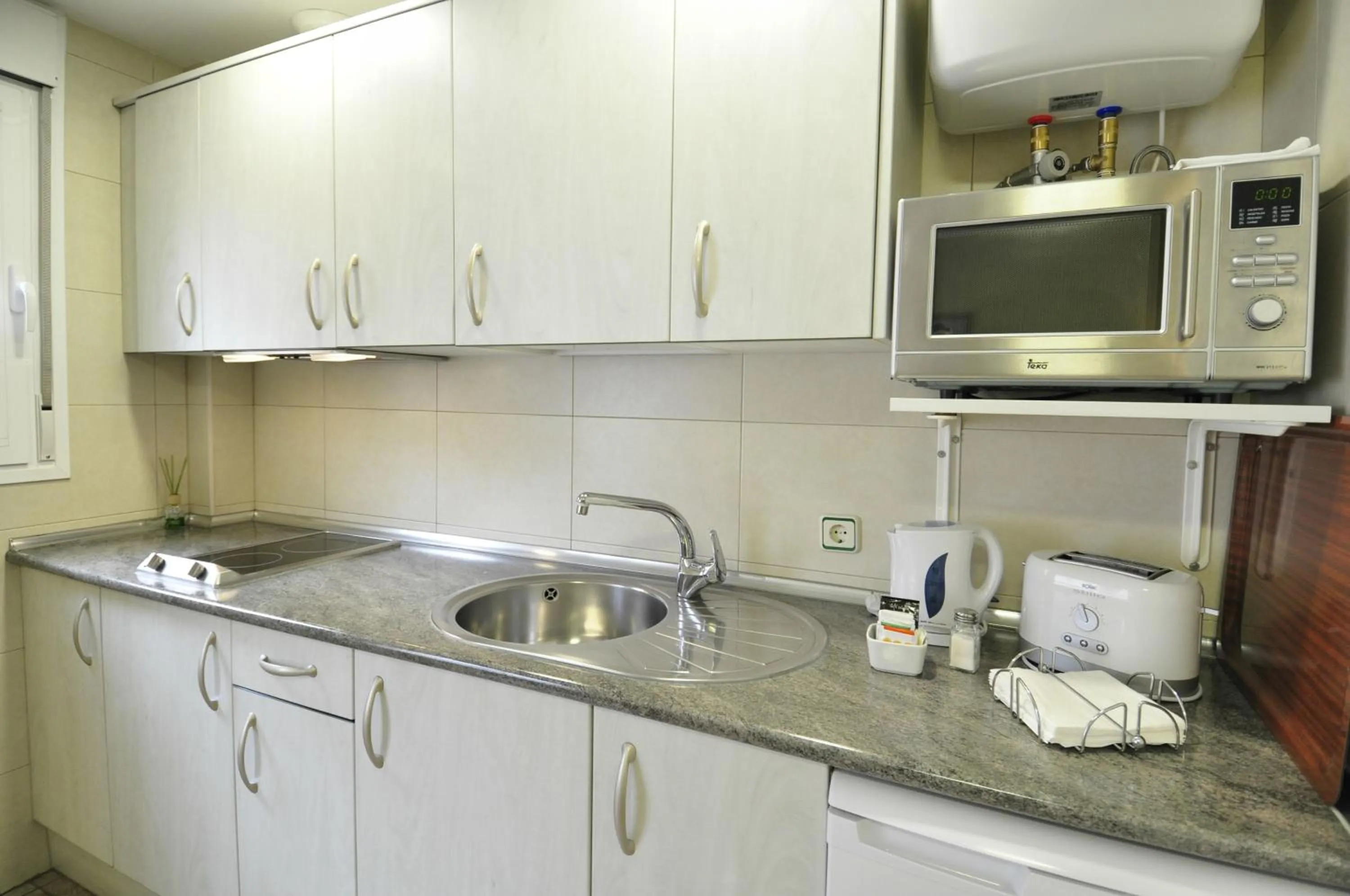 Kitchen or kitchenette in Hotel Apartamentos Aralso
