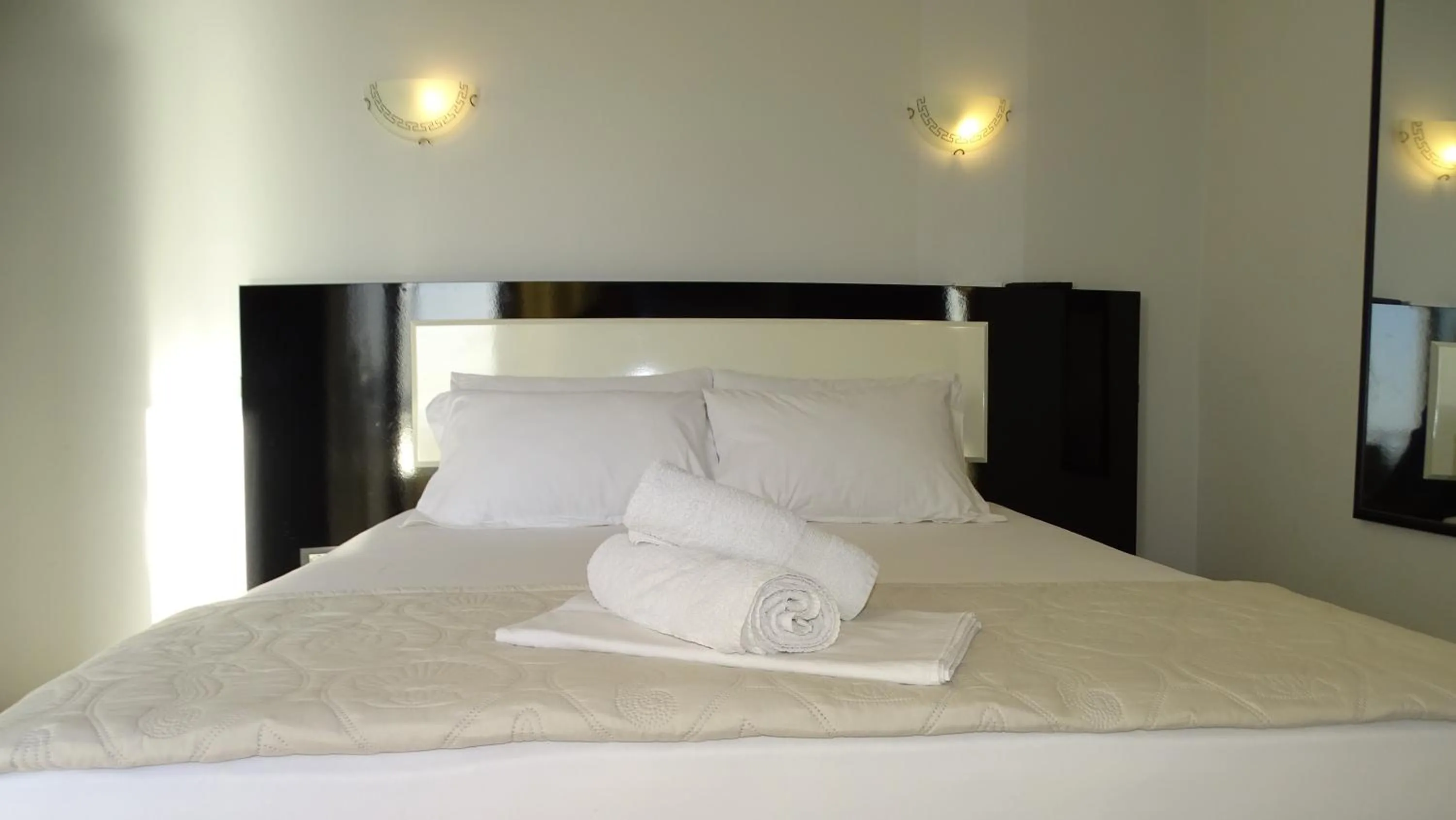 Bed in Hotel Ardiani