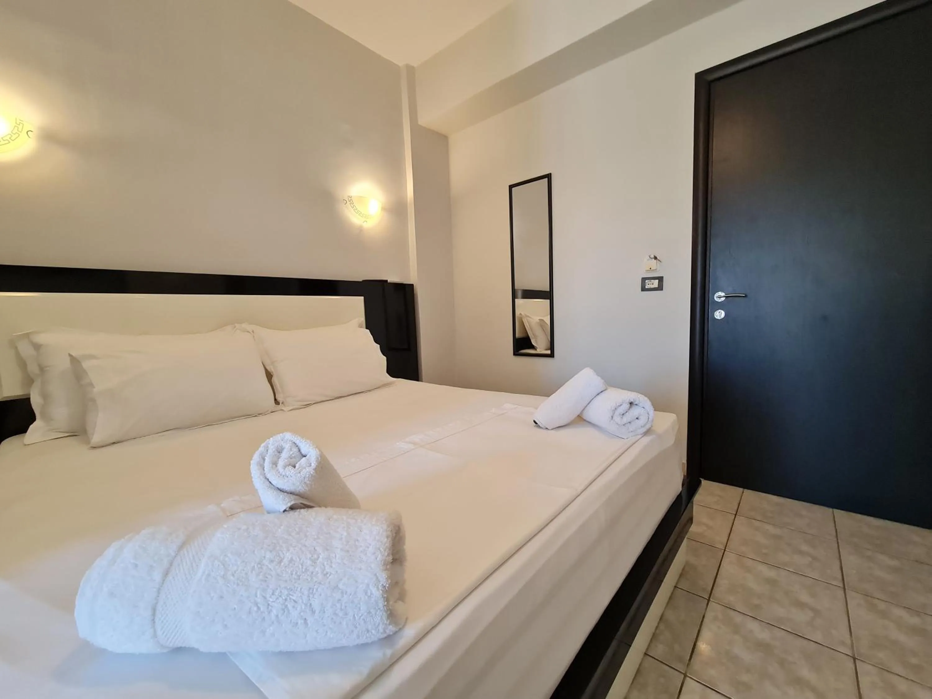 Bed in Hotel Ardiani