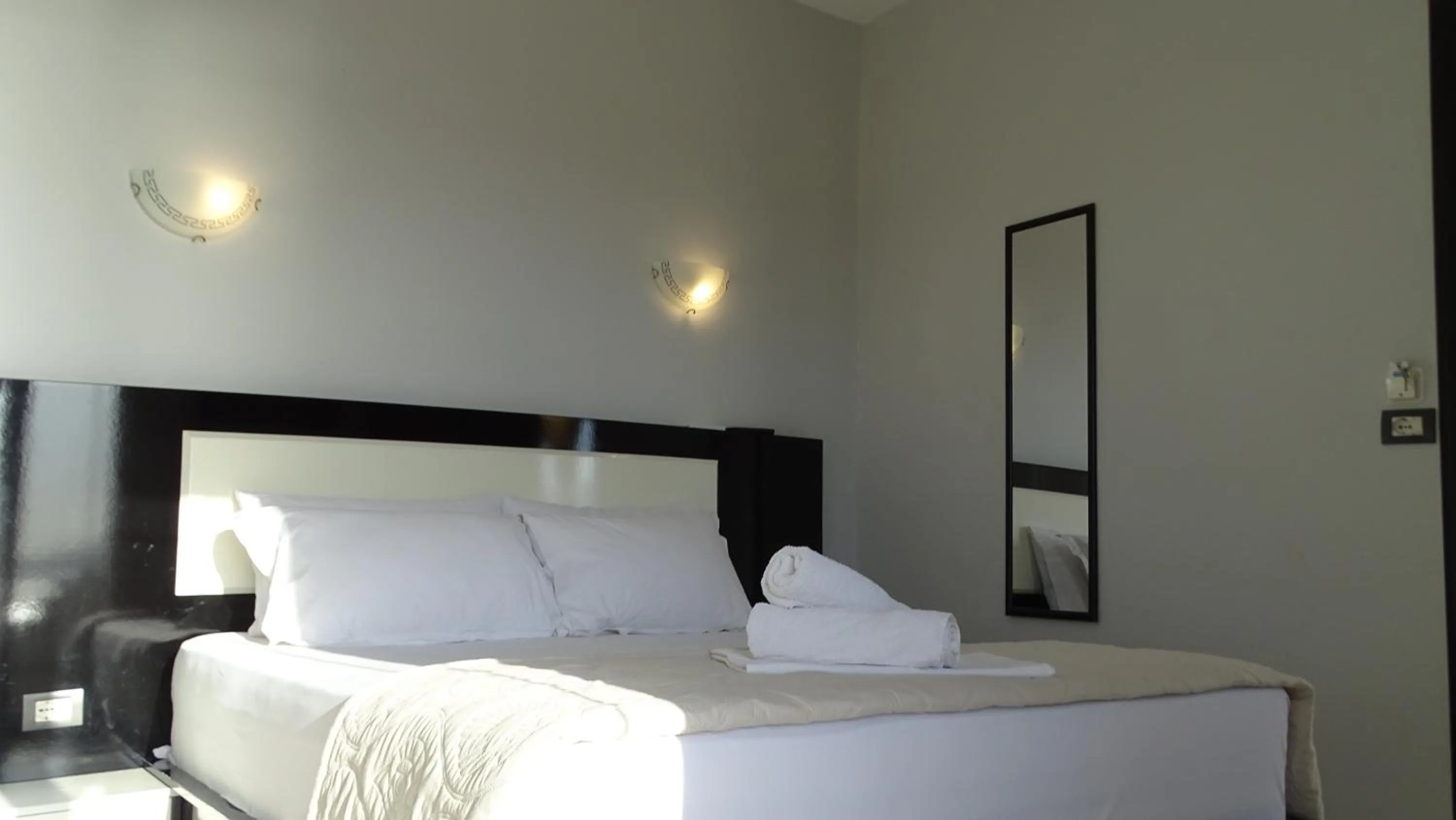 Bed in Hotel Ardiani