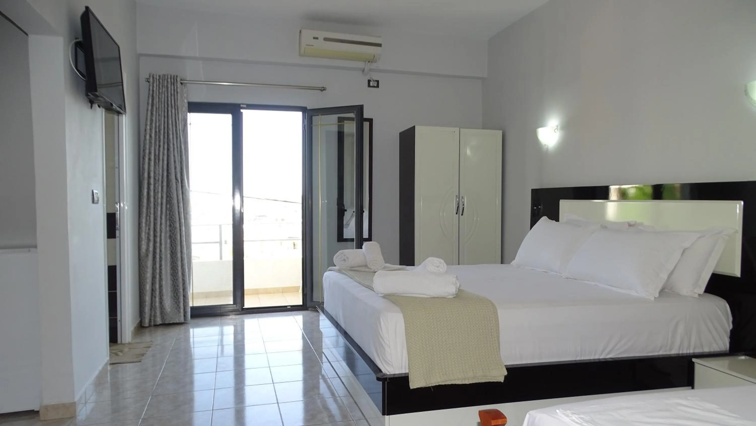 Bed in Hotel Ardiani