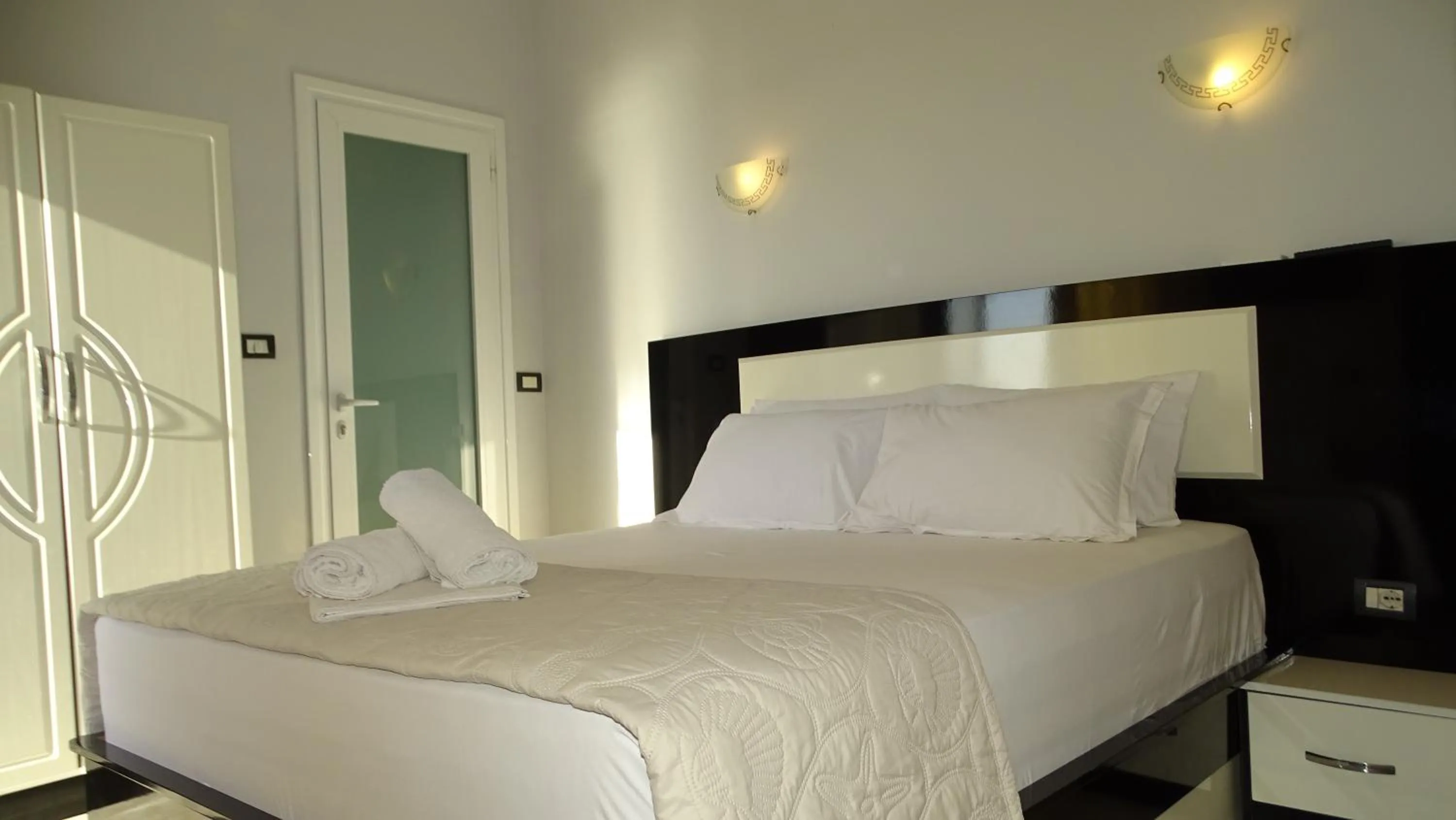 Bed in Hotel Ardiani