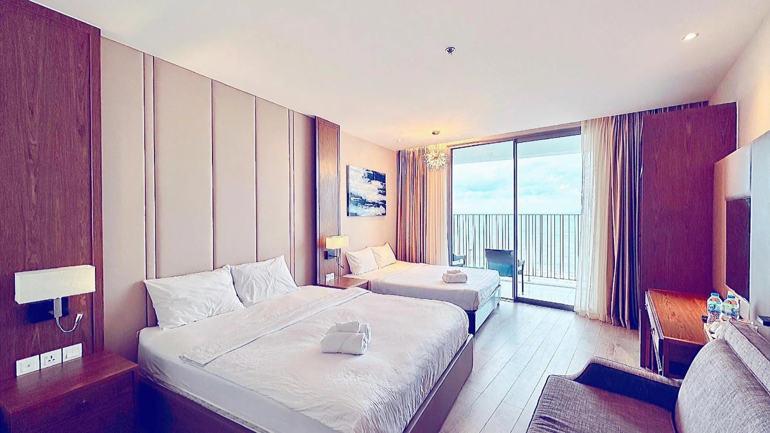 Bed in PANORAMA Condotel by HLG