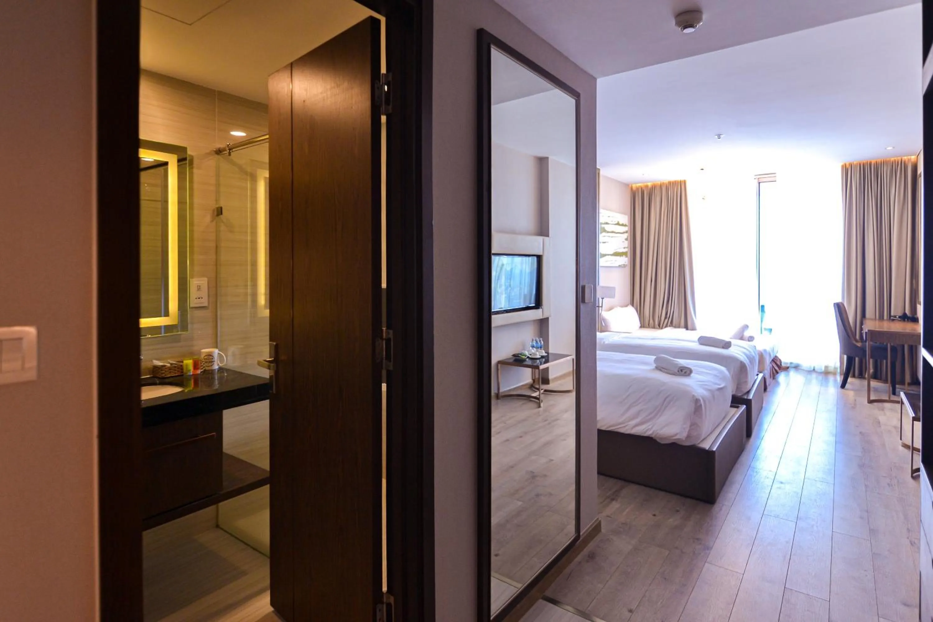 Bed in PANORAMA Condotel by HLG