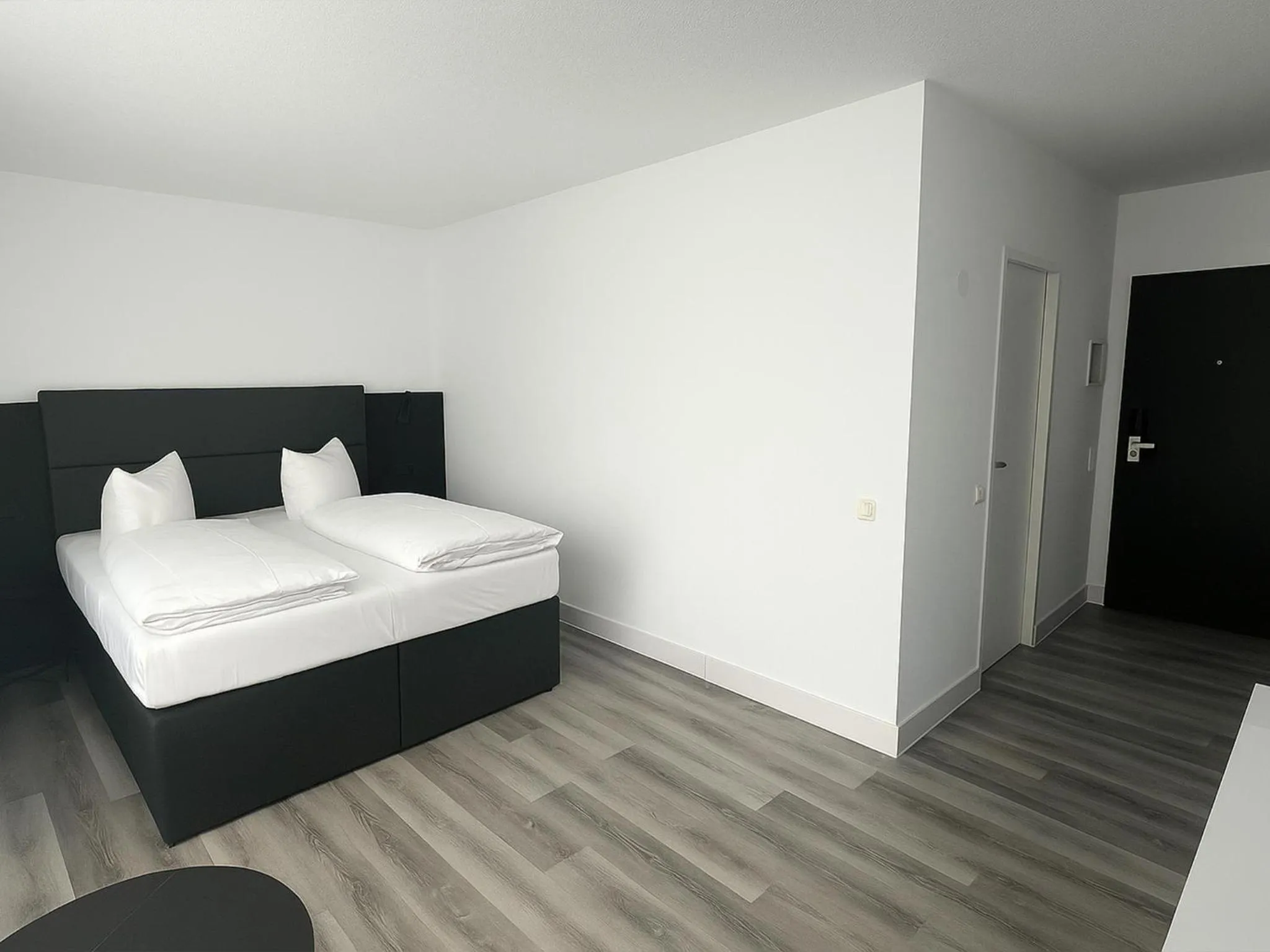 Photo of the whole room, Bed in DORMERO Hotel Dessau-Roßlau