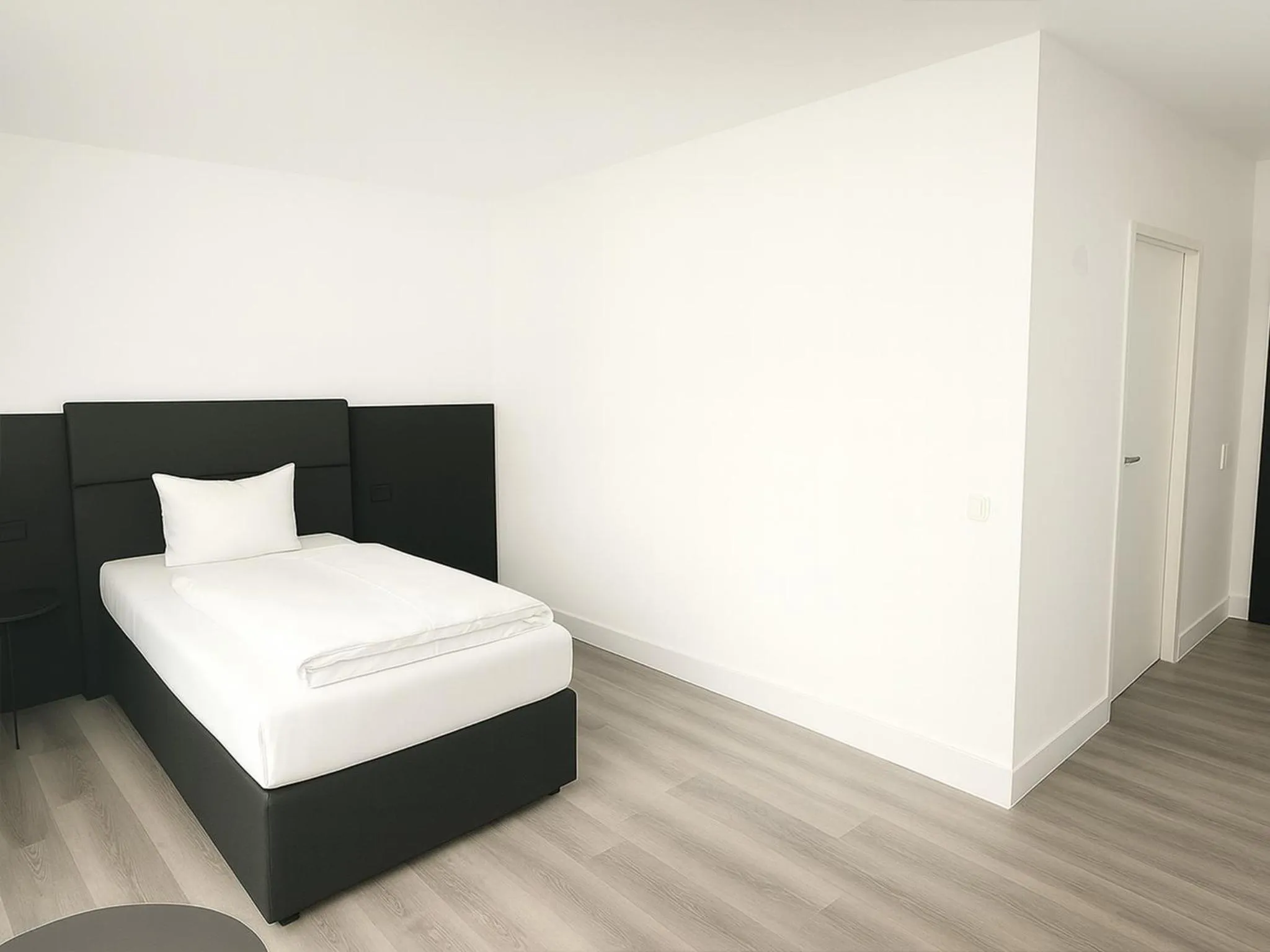 Photo of the whole room, Bed in DORMERO Hotel Dessau-Roßlau