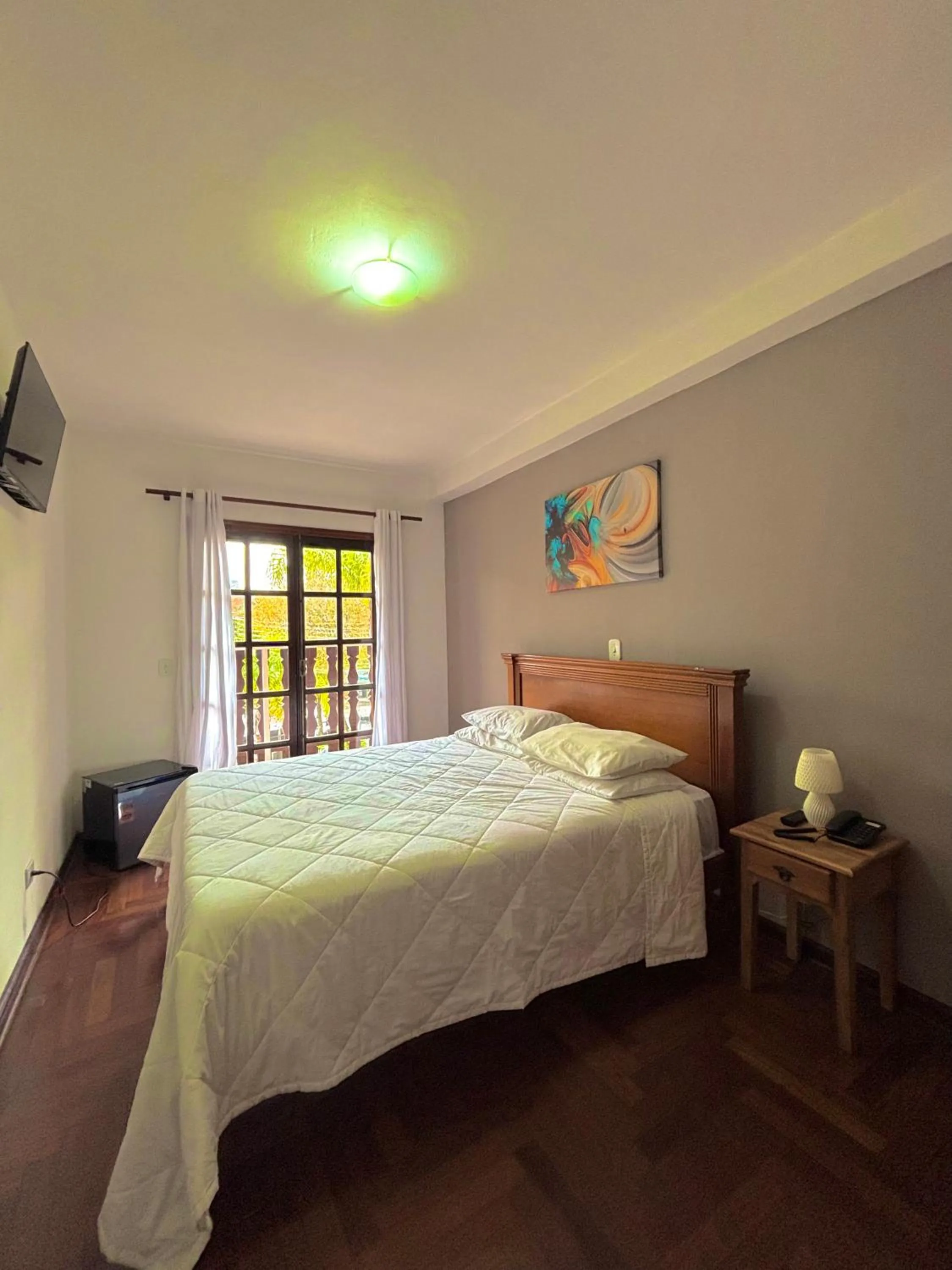 Bed in Pousada Portal da Serra