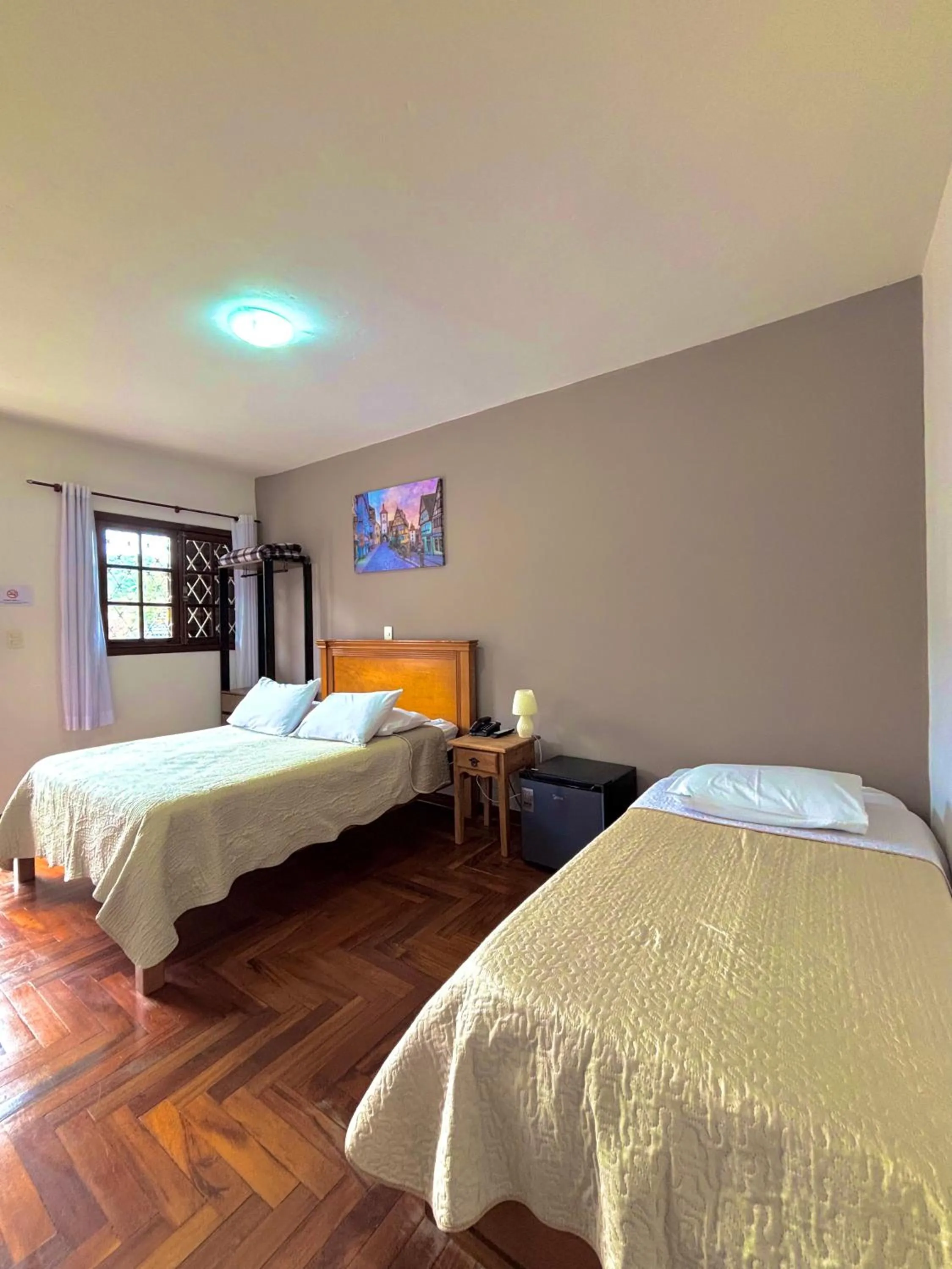 Photo of the whole room, Bed in Pousada Portal da Serra