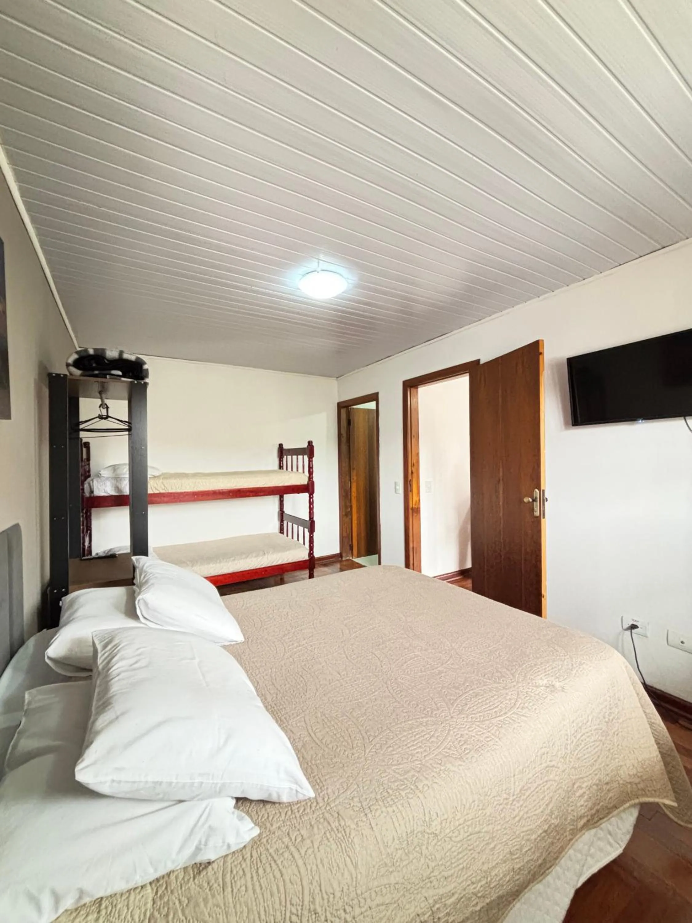 Bed in Pousada Portal da Serra