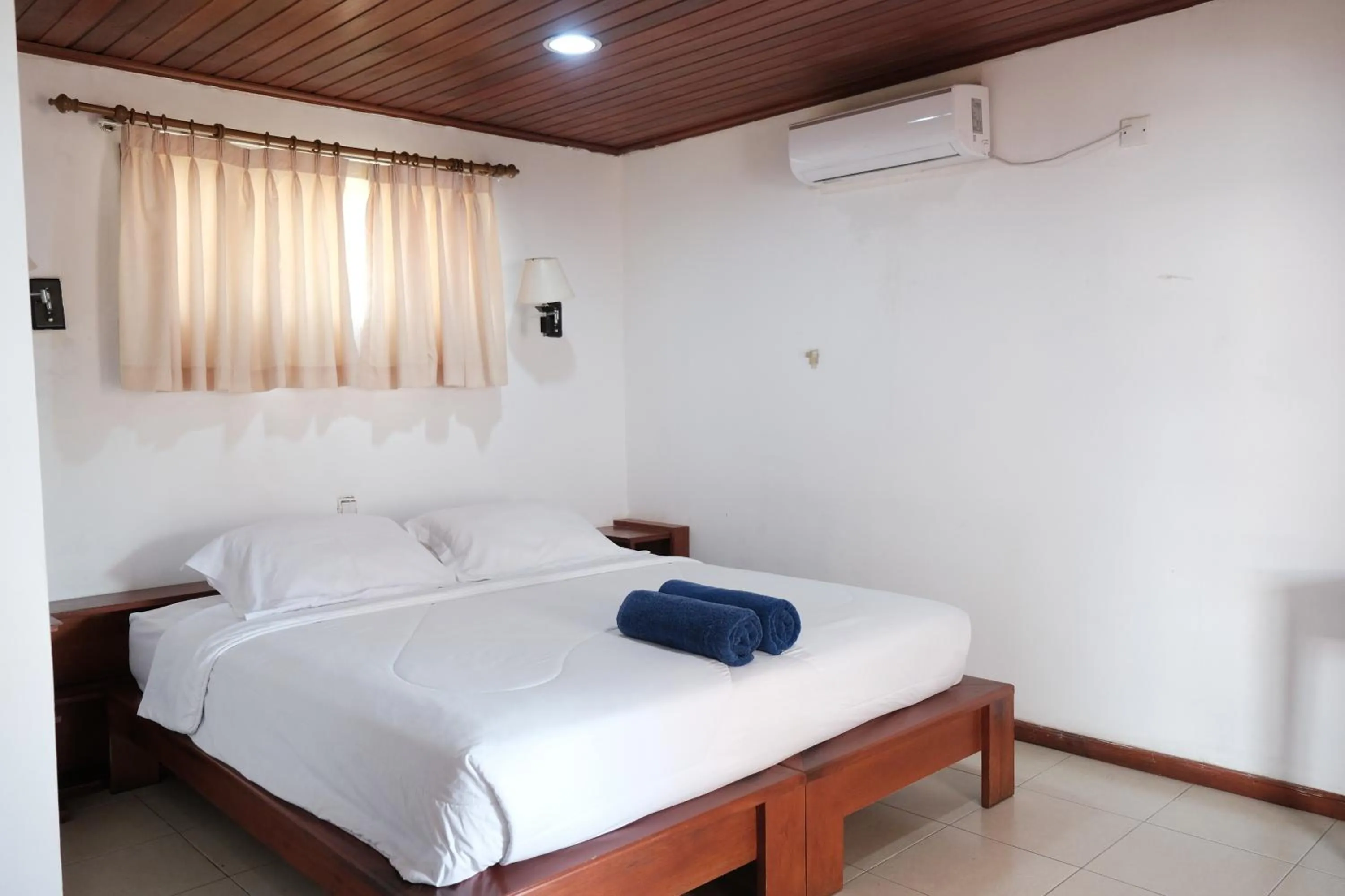 Bed in Arbiru Beach Resort