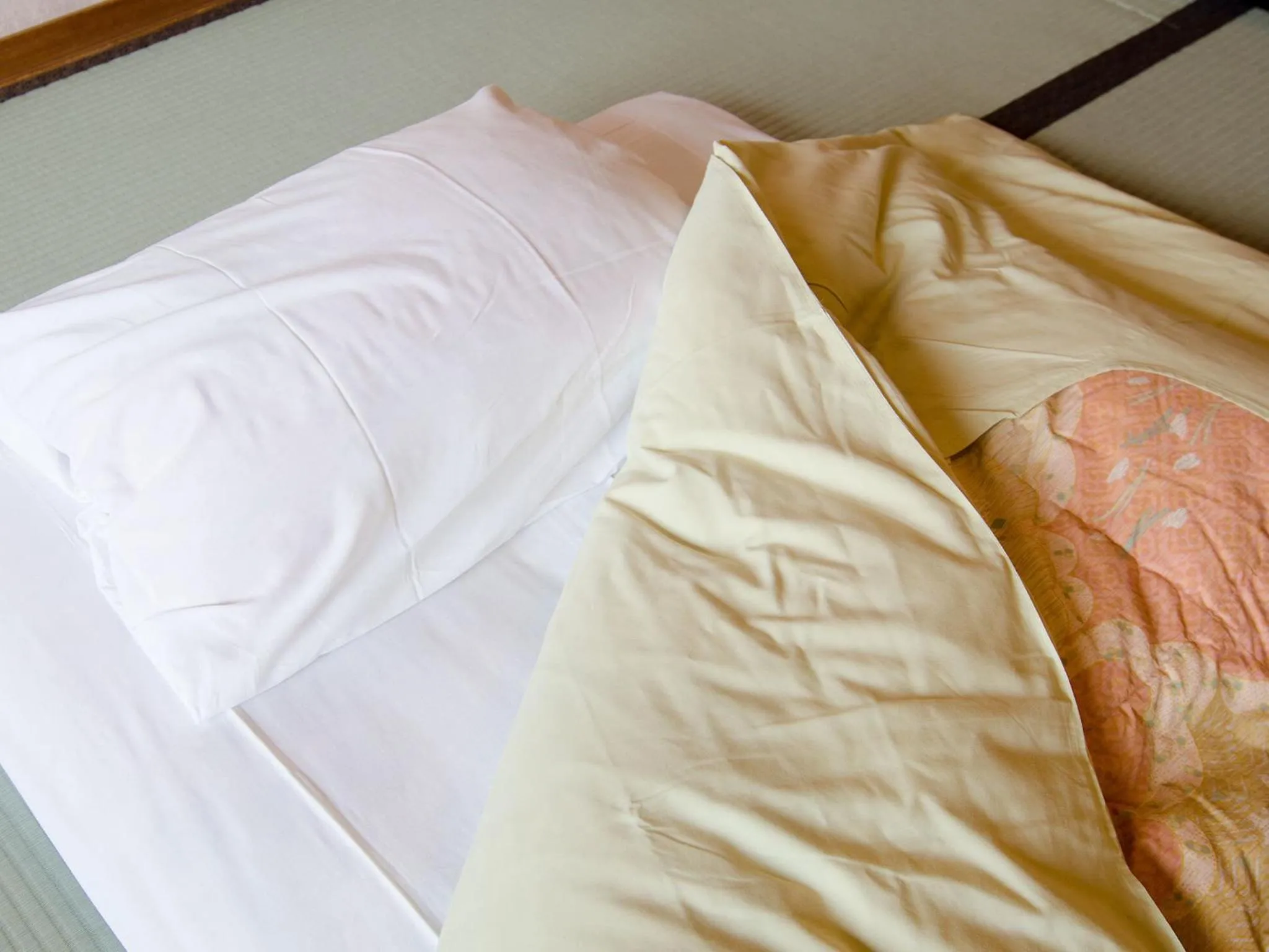 Bed in Hotel Musashiya