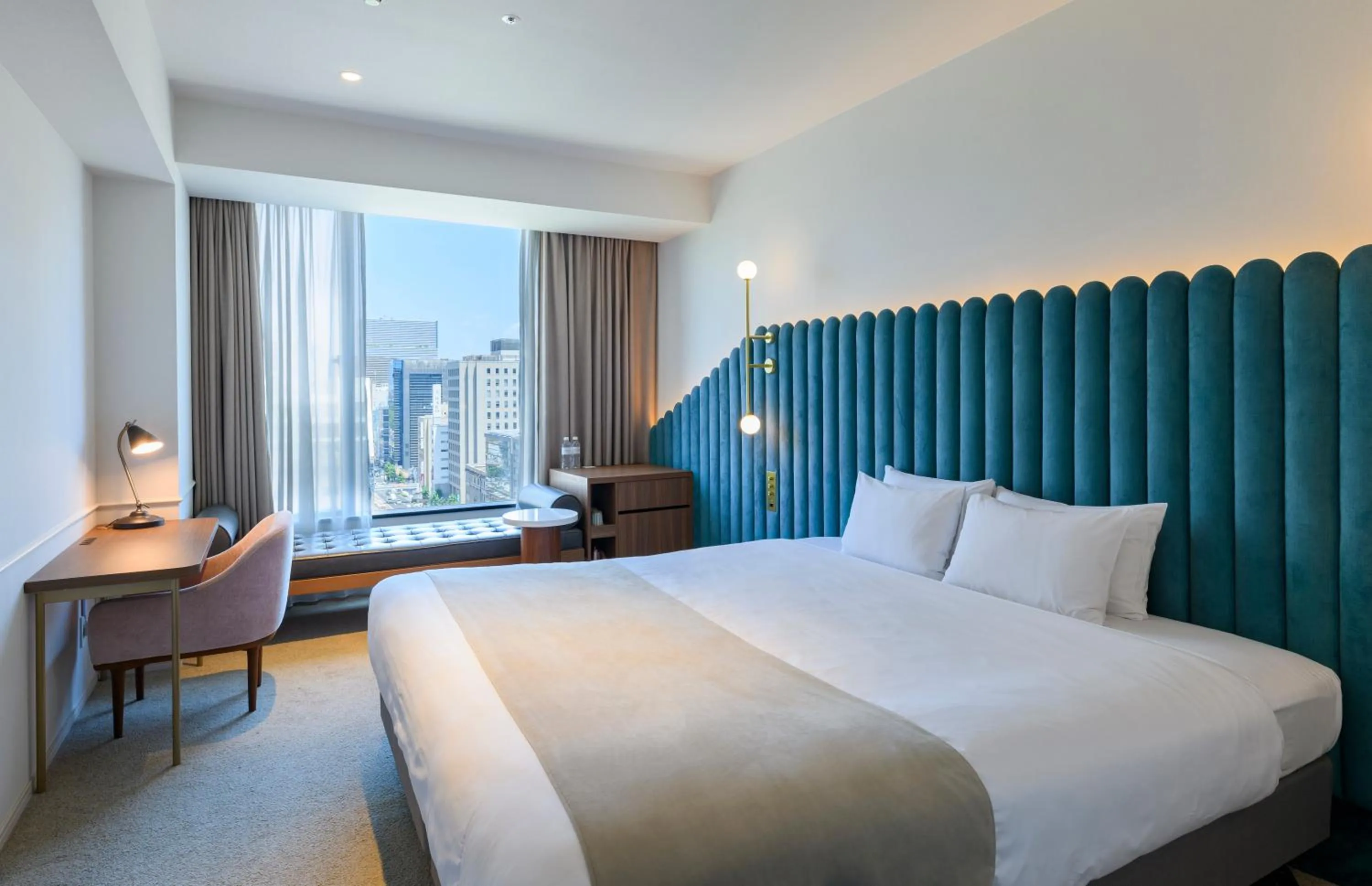 Photo of the whole room, Bed in The Knot Hiroshima