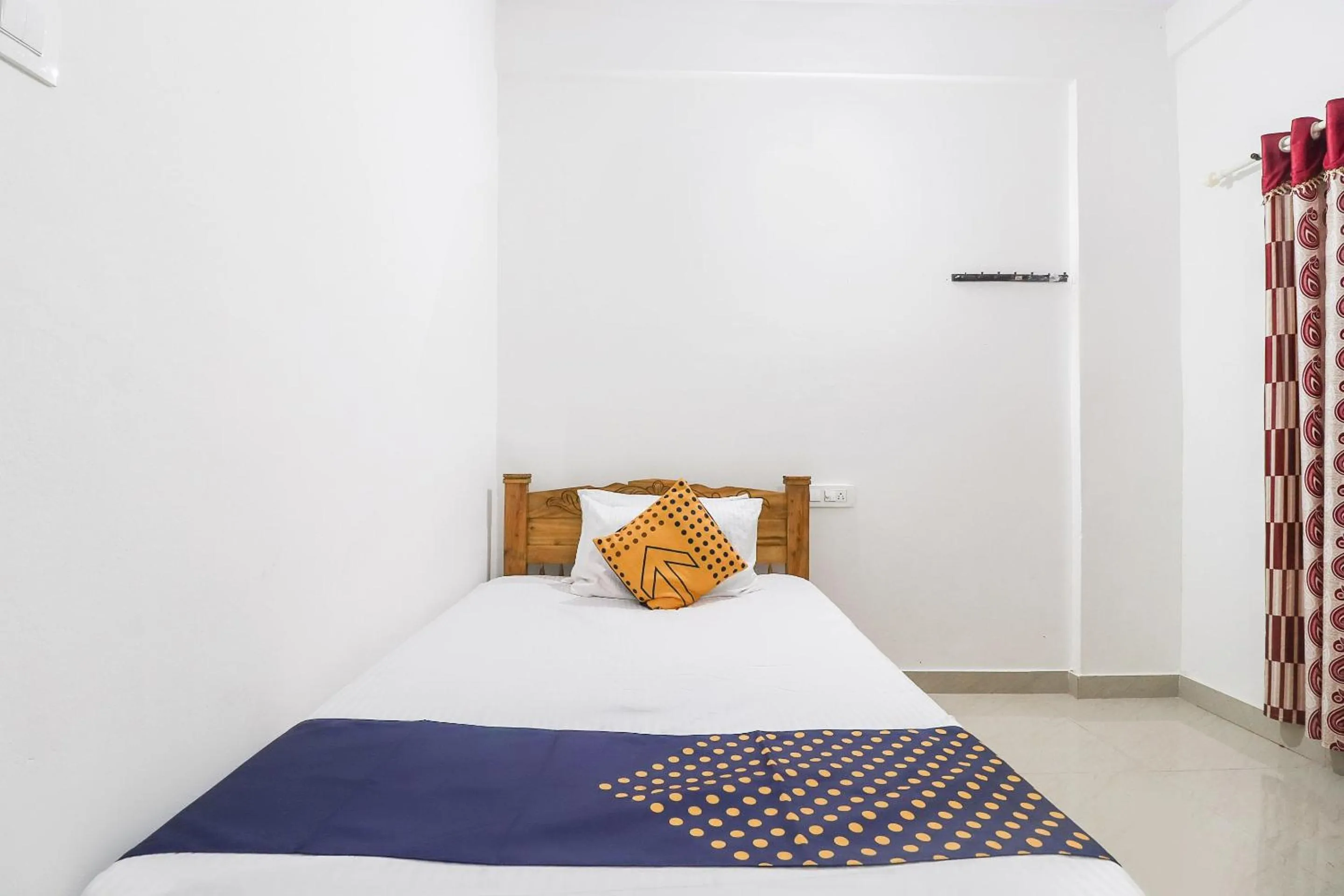 Bedroom, Bed in SPOT ON Rohini Inn Kadampuzha